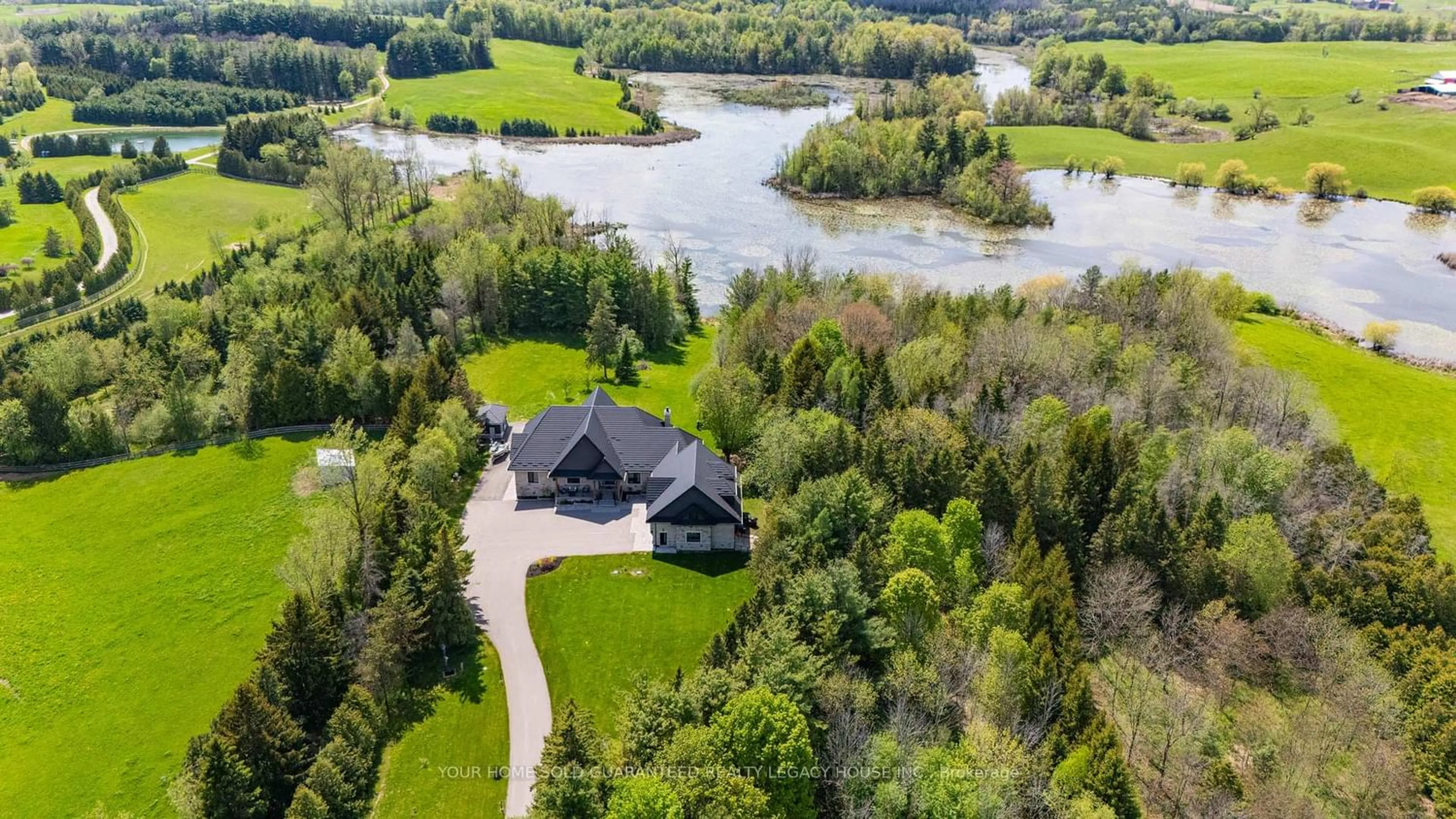 A pic from outside/outdoor area/front of a property/back of a property/a pic from drone, water/lake/river/ocean view for 15670 10th Concession Rd, King Ontario L0G 1T0