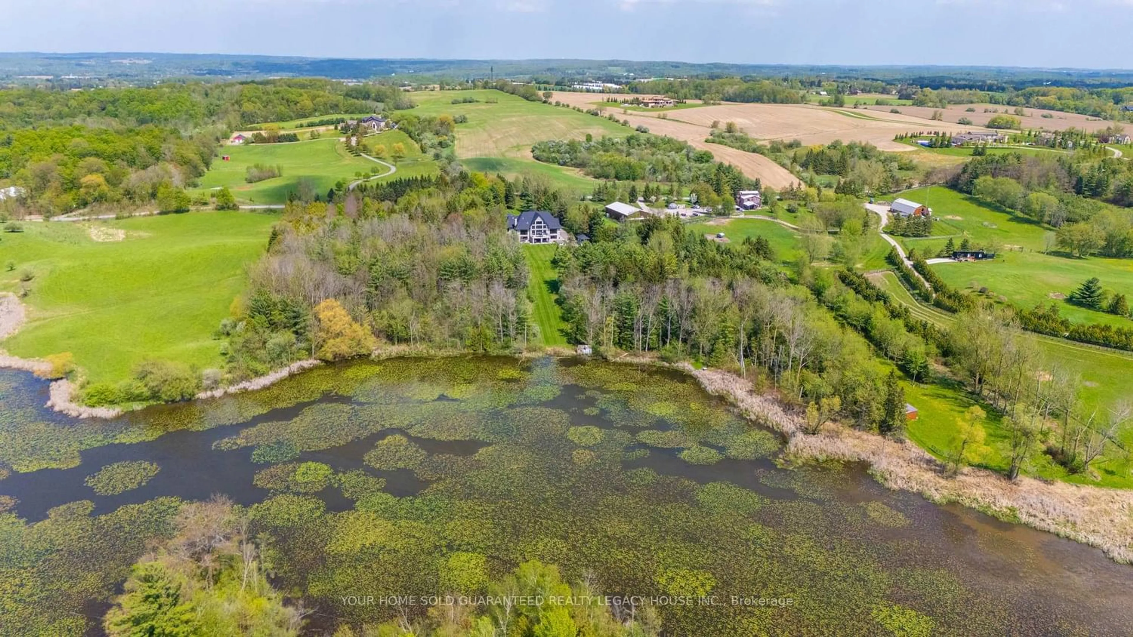 A pic from outside/outdoor area/front of a property/back of a property/a pic from drone, water/lake/river/ocean view for 15670 10th Concession Rd, King Ontario L0G 1T0