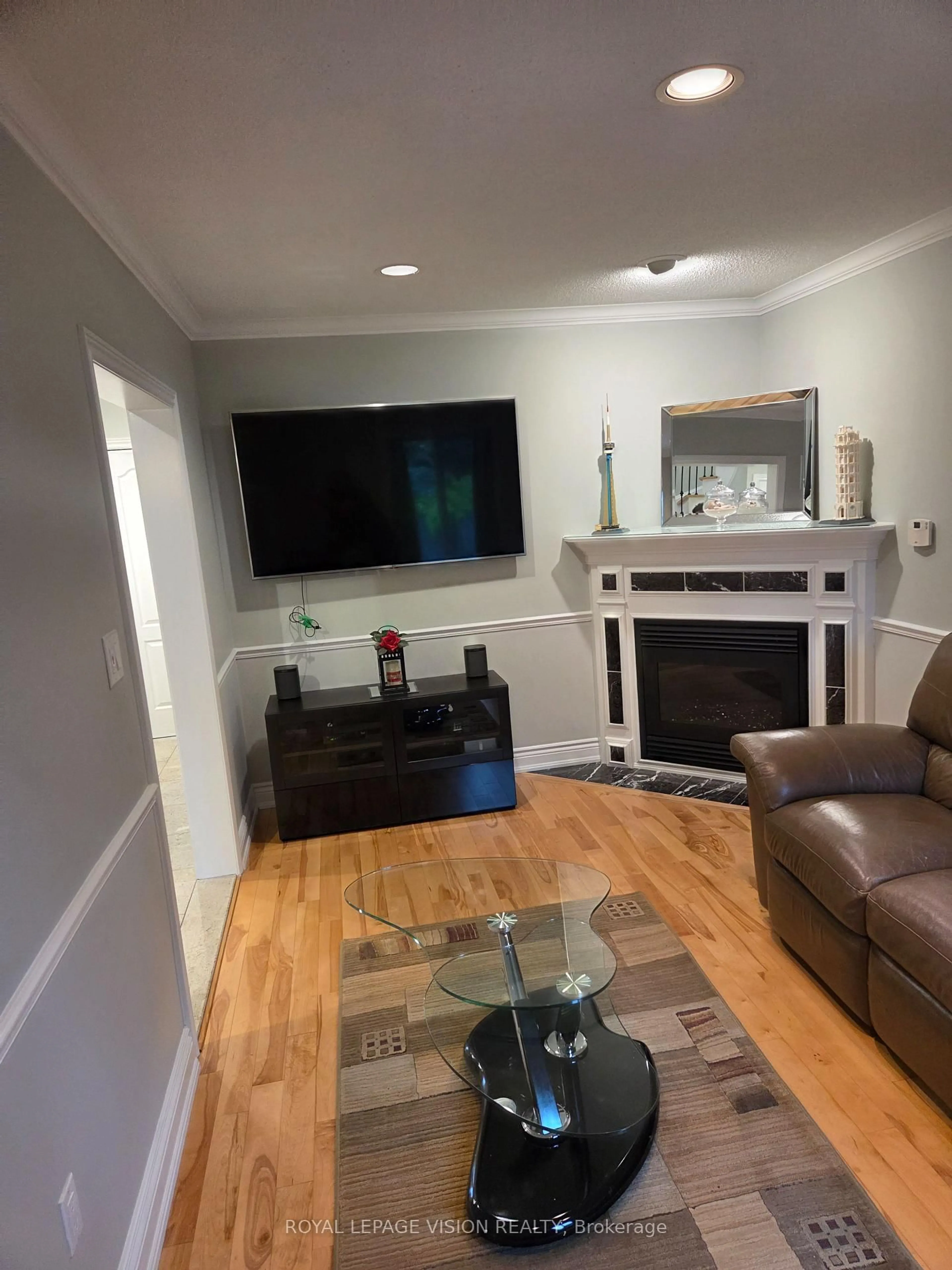 Living room with furniture, wood/laminate floor for 91 Princeton Gate, Vaughan Ontario L6A 2S7