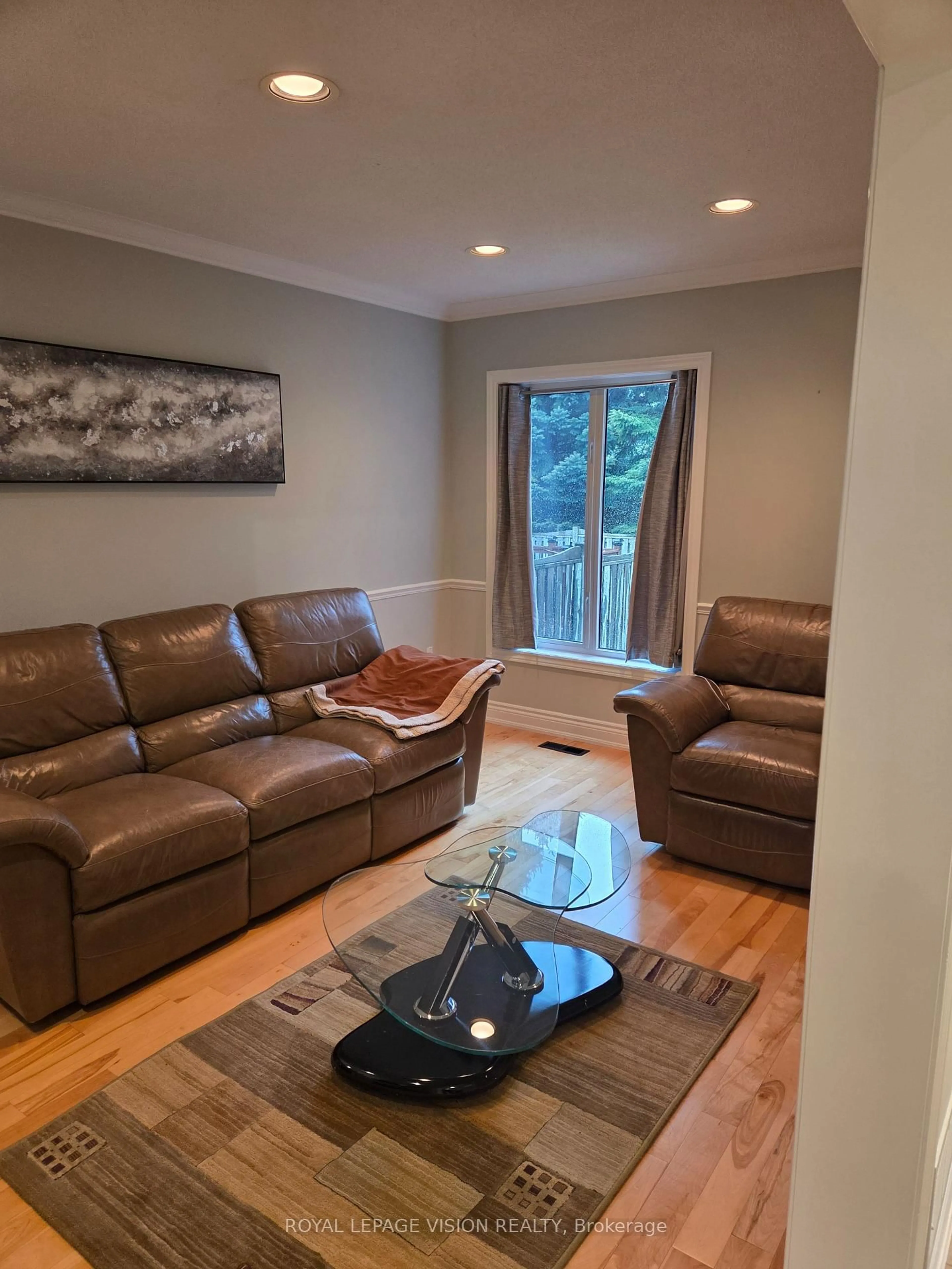 Living room with furniture, wood/laminate floor for 91 Princeton Gate, Vaughan Ontario L6A 2S7
