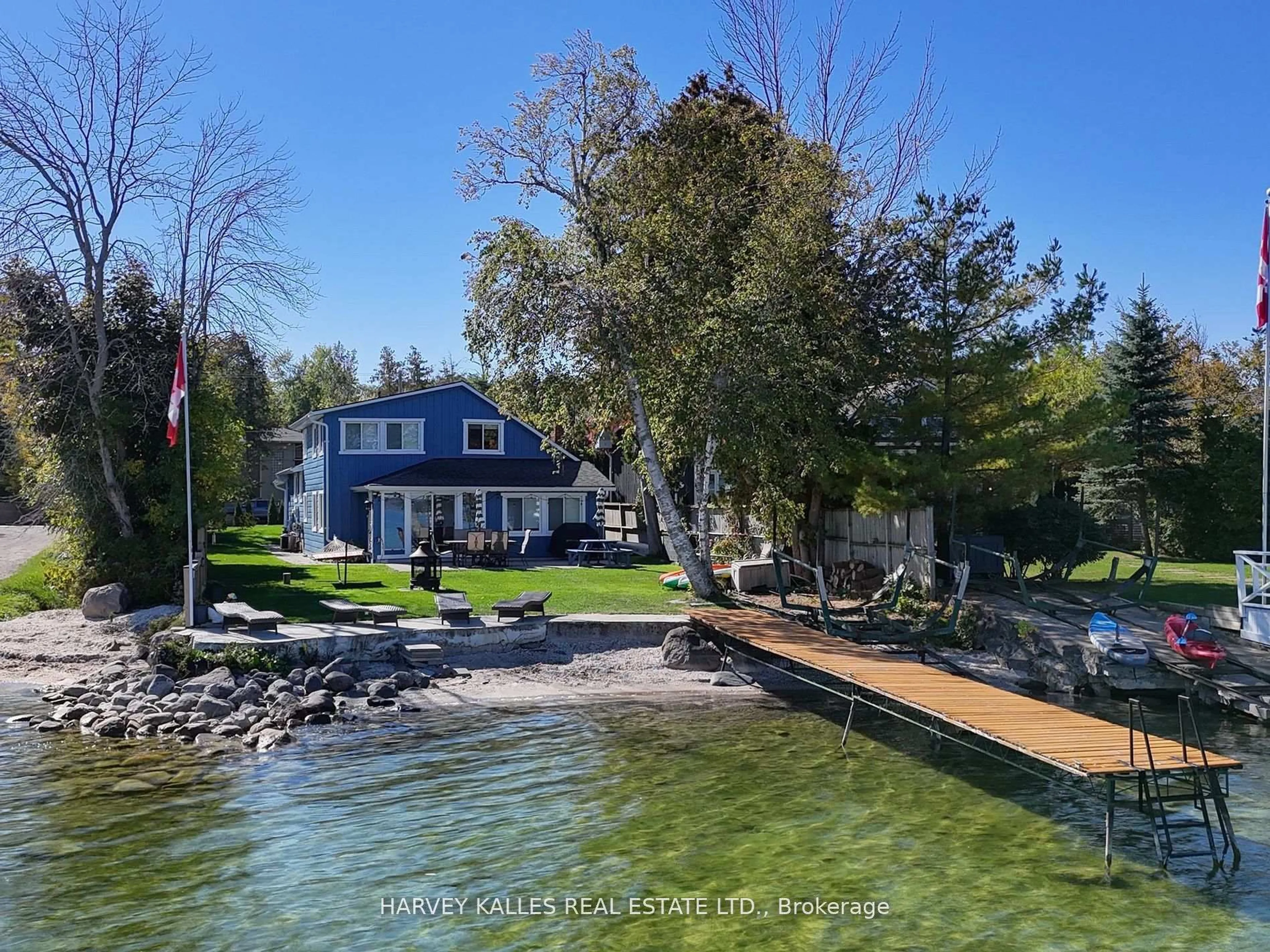 A pic from outside/outdoor area/front of a property/back of a property/a pic from drone, water/lake/river/ocean view for 72 Lakeside Dr, Innisfil Ontario L9S 2V3