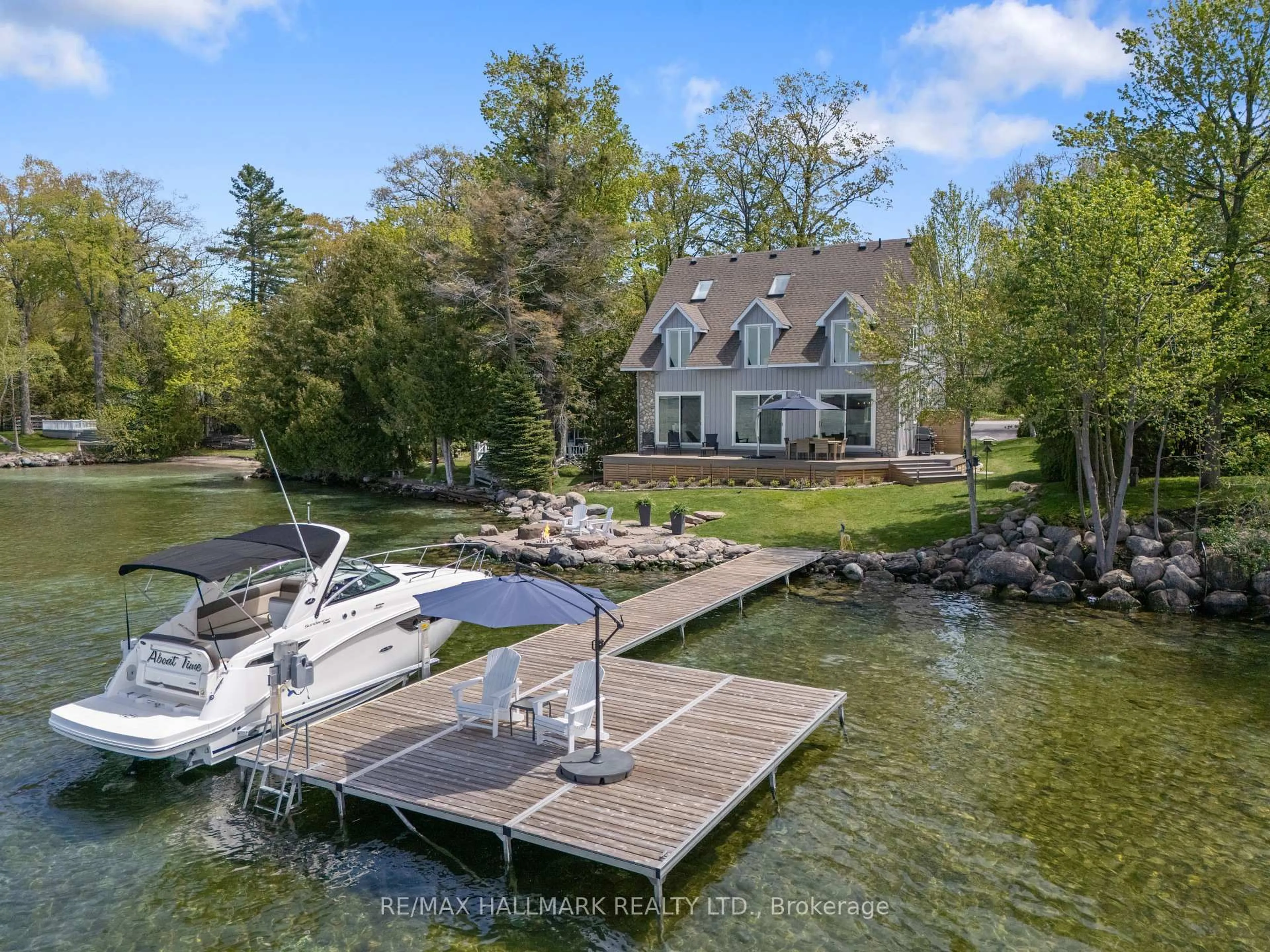 A pic from outside/outdoor area/front of a property/back of a property/a pic from drone, water/lake/river/ocean view for 30 Gooch Park Dr, Innisfil Ontario L9S 2S6