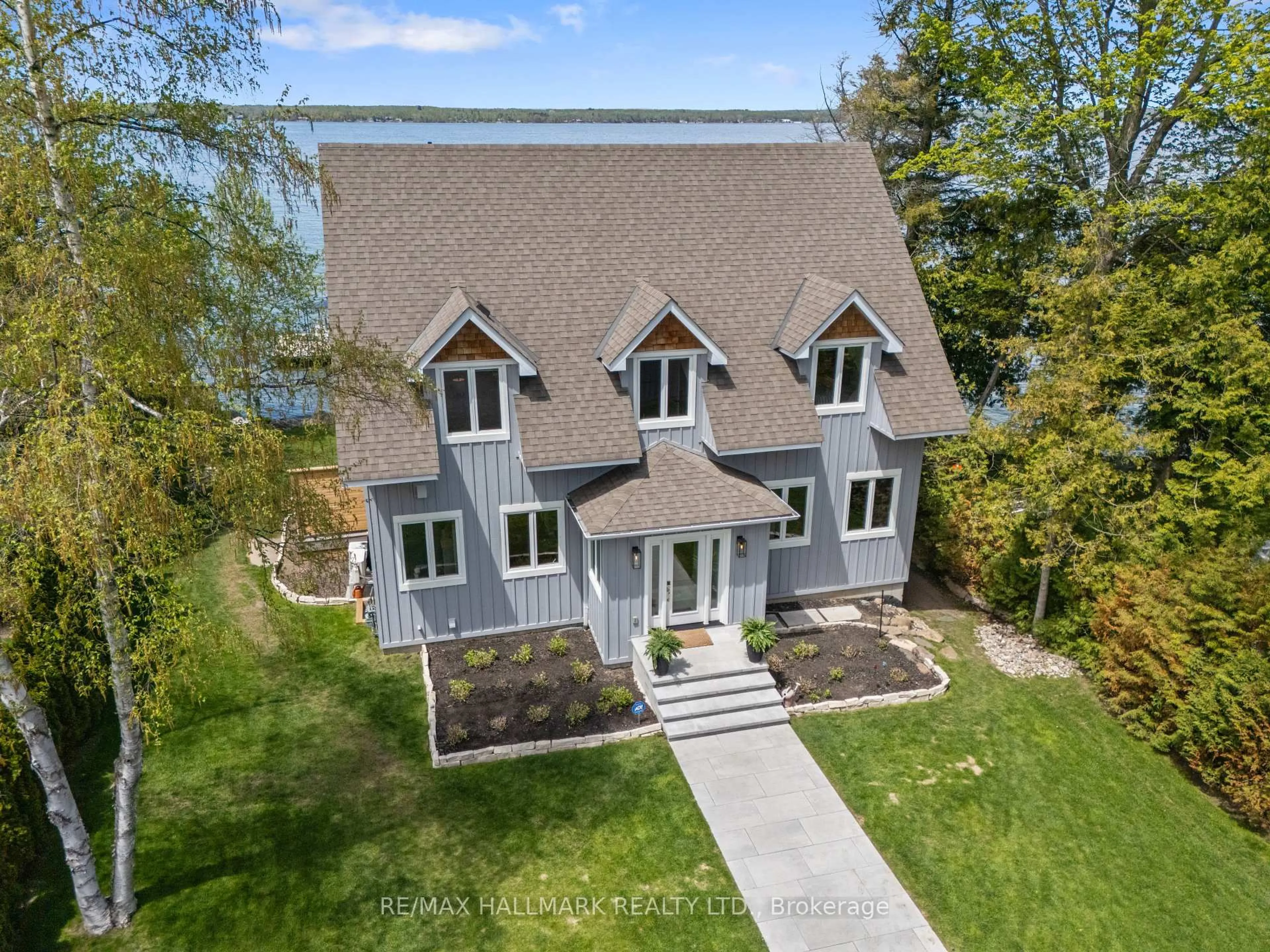 A pic from outside/outdoor area/front of a property/back of a property/a pic from drone, water/lake/river/ocean view for 30 Gooch Park Dr, Innisfil Ontario L9S 2S6