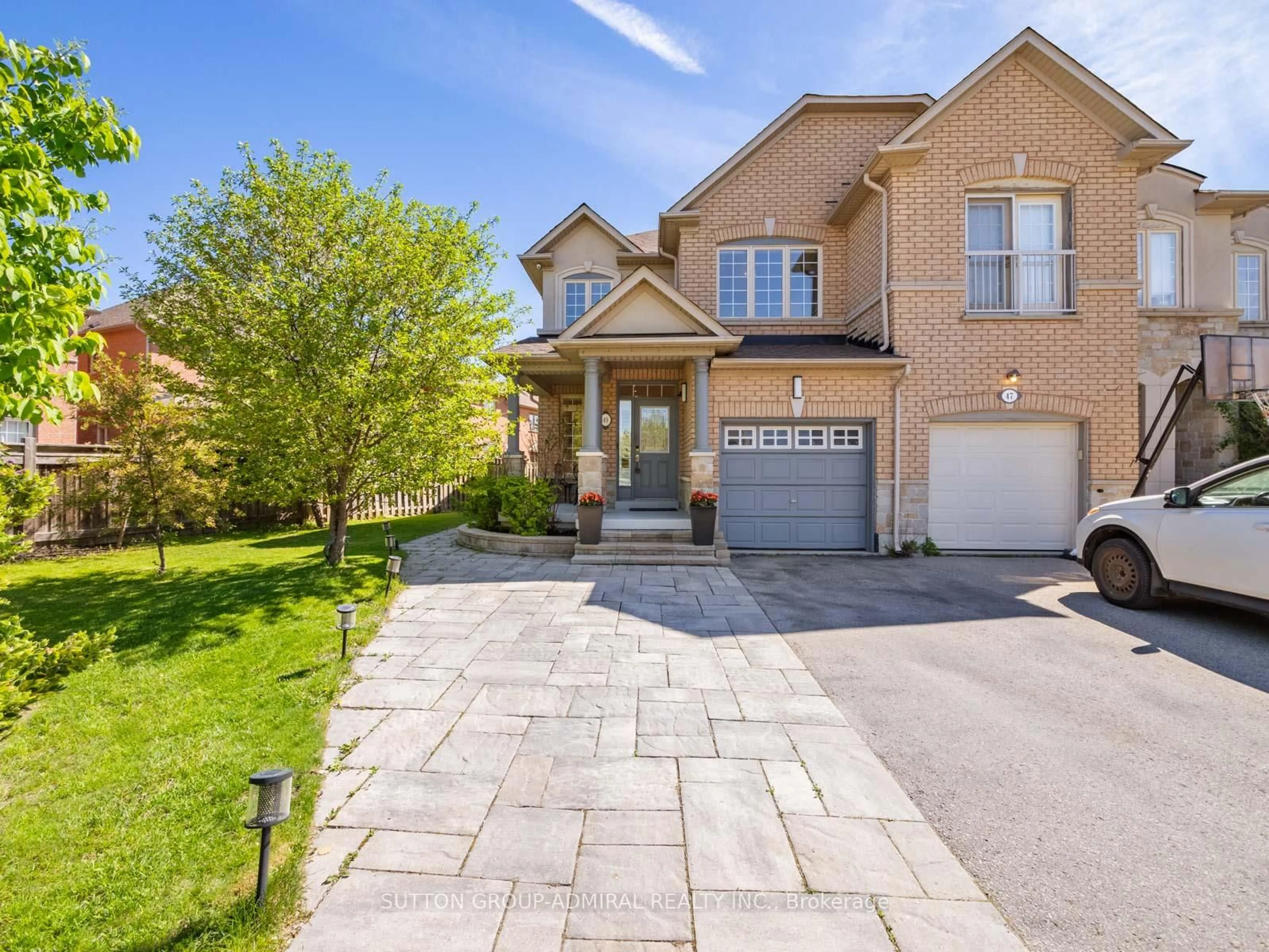 Home with brick exterior material, street for 49 Loire Valley Ave, Vaughan Ontario L4J 8V8