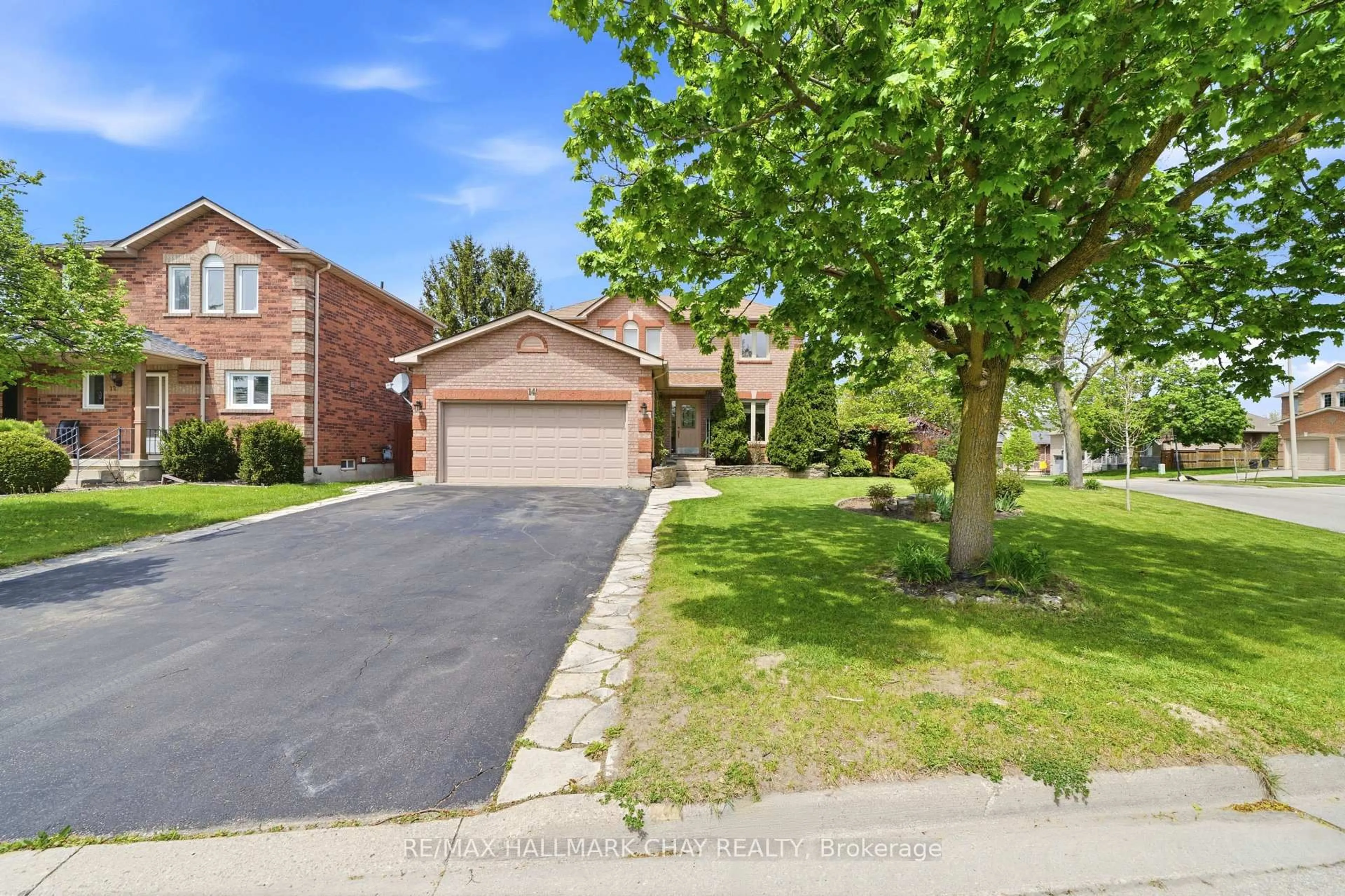 A pic from outside/outdoor area/front of a property/back of a property/a pic from drone, street for 14 Dugdale Ave, New Tecumseth Ontario L0G 1A0