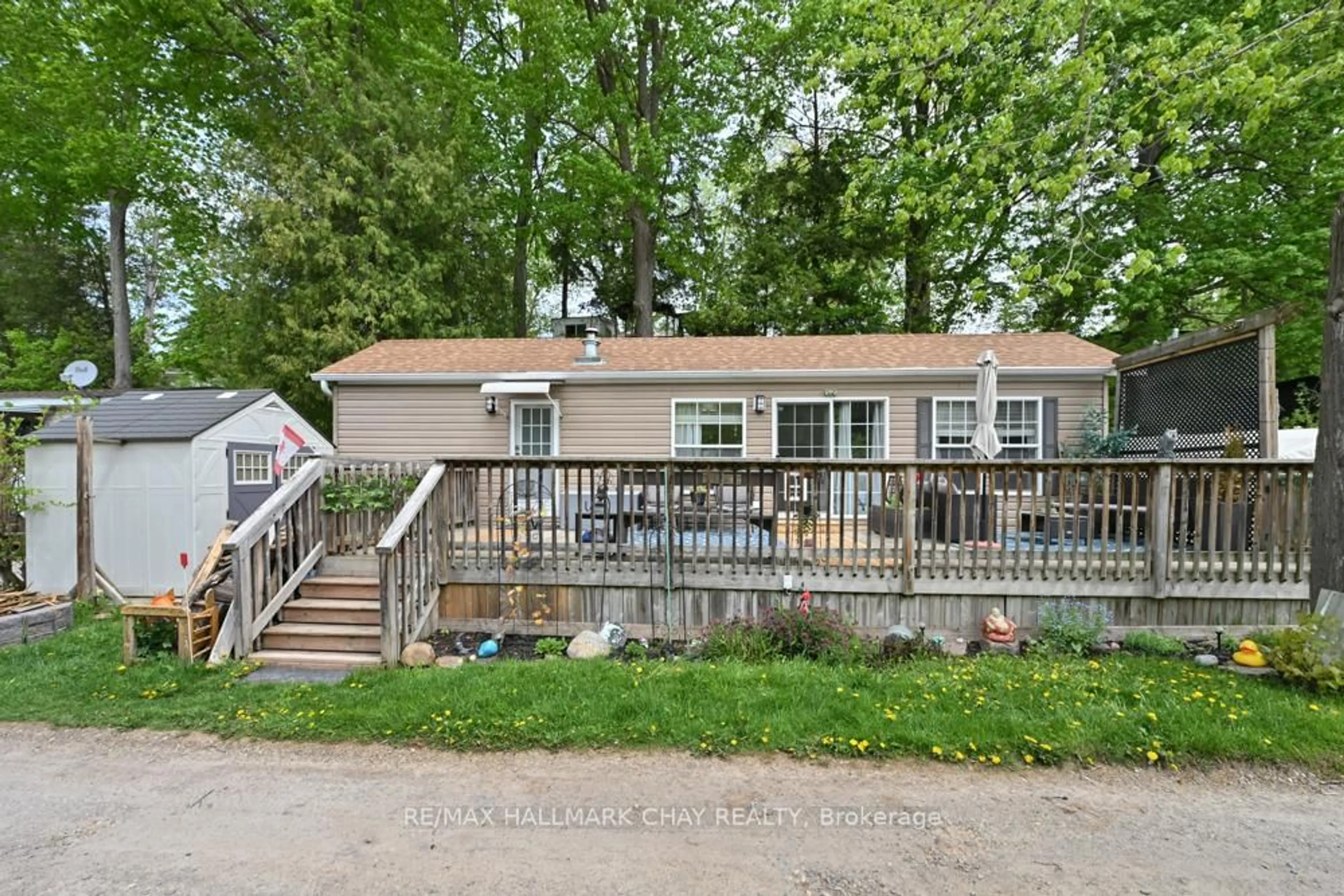 Home with vinyl exterior material, street for 6047 HWY 89 #93, New Tecumseth Ontario L9R 2G2