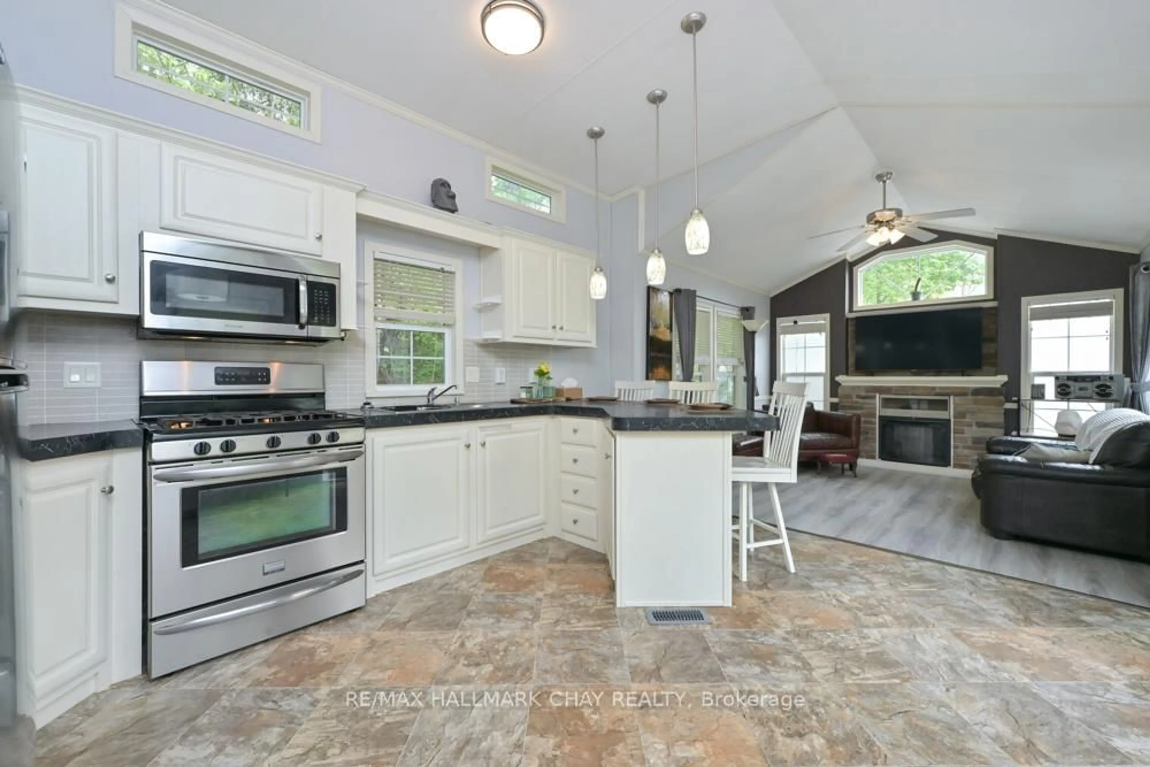 Open concept kitchen, ceramic/tile floor for 6047 HWY 89 #93, New Tecumseth Ontario L9R 2G2