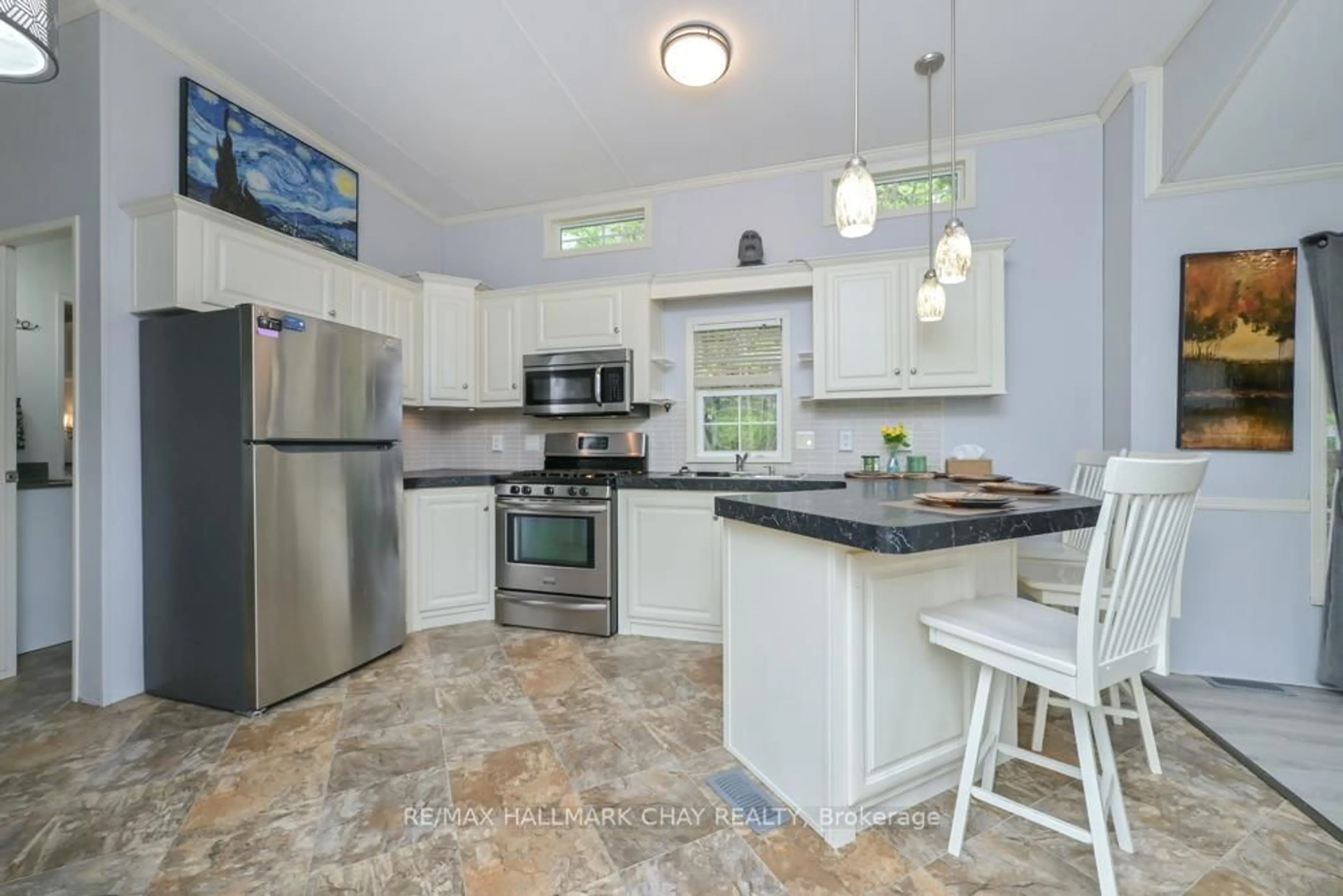 Open concept kitchen, ceramic/tile floor for 6047 HWY 89 #93, New Tecumseth Ontario L9R 2G2