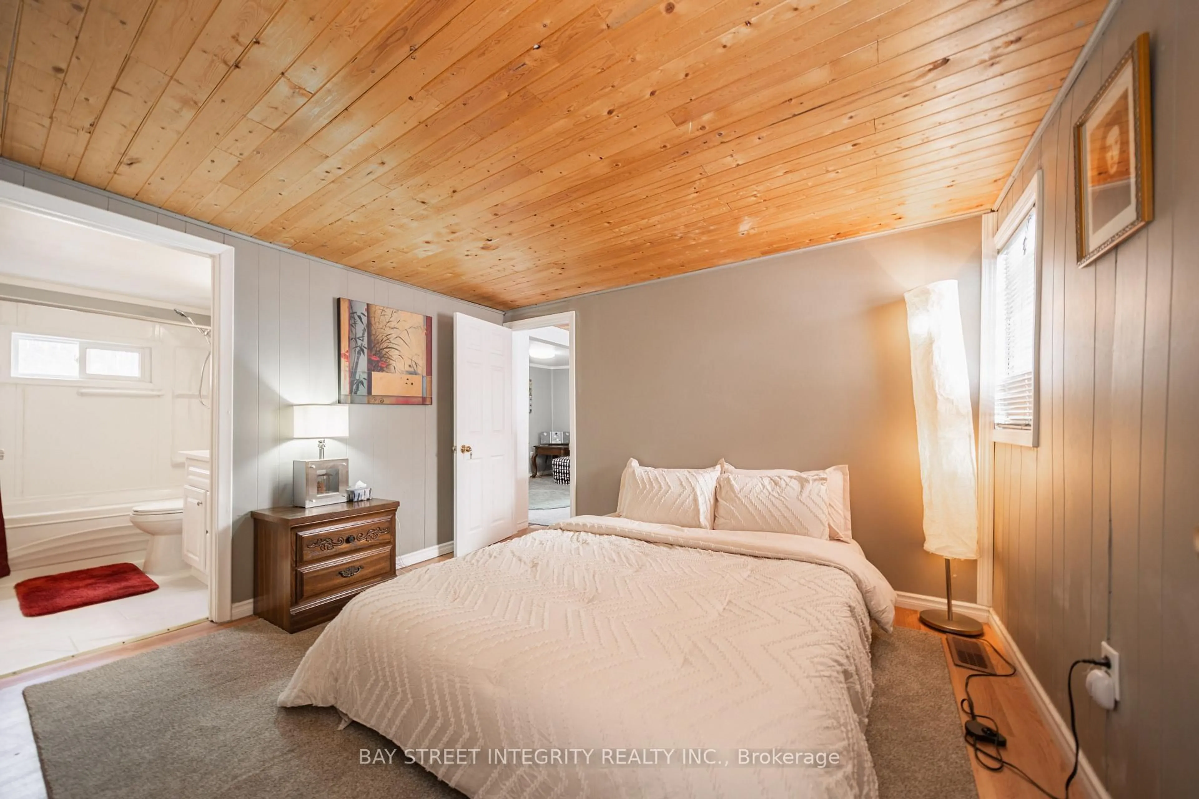 Bedroom with bed, wood/laminate floor for 74 De La Salle Blvd, Georgina Ontario L0E 1S0