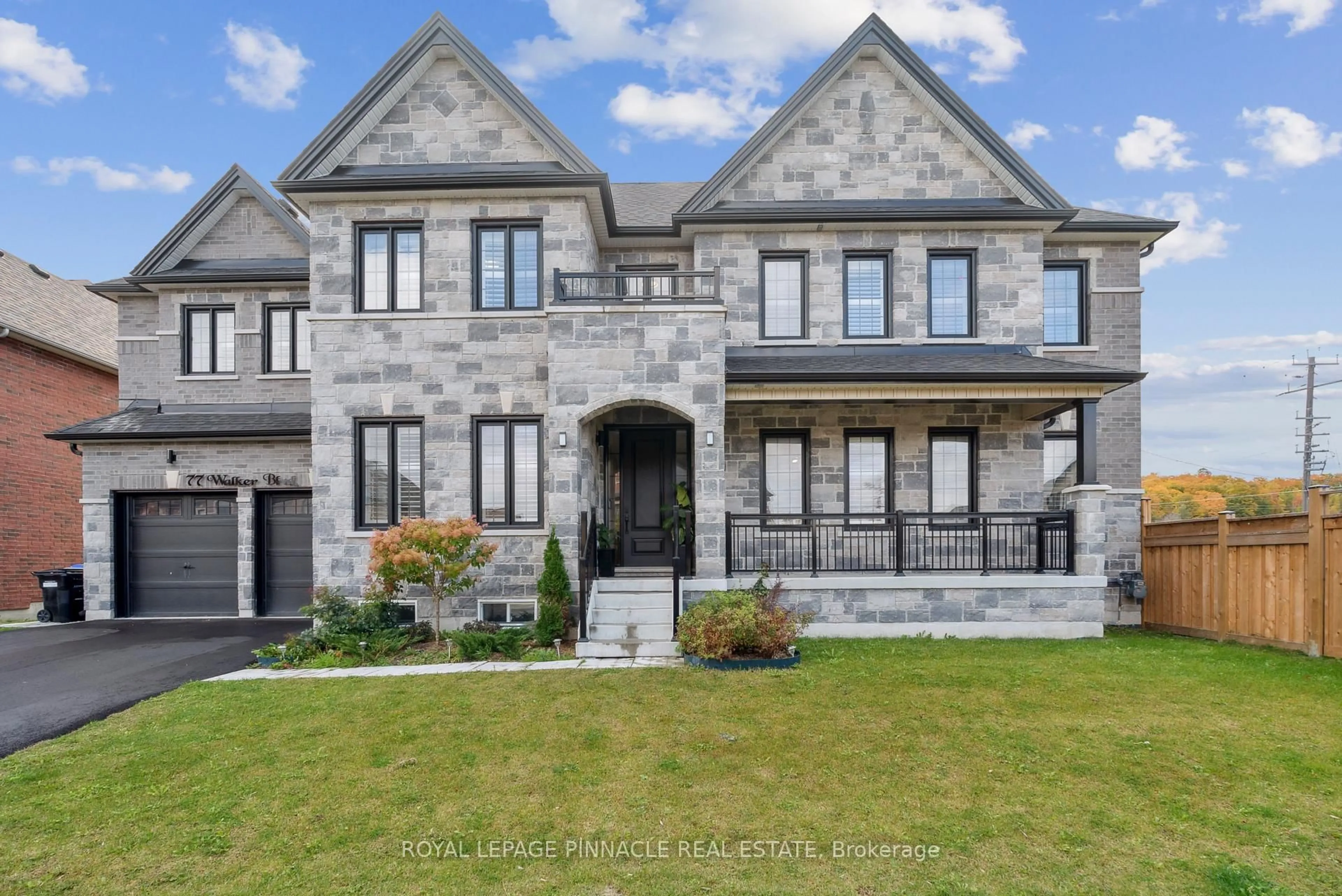 Home with brick exterior material, street for 77 Walkers Blvd, New Tecumseth Ontario L9R 0N3