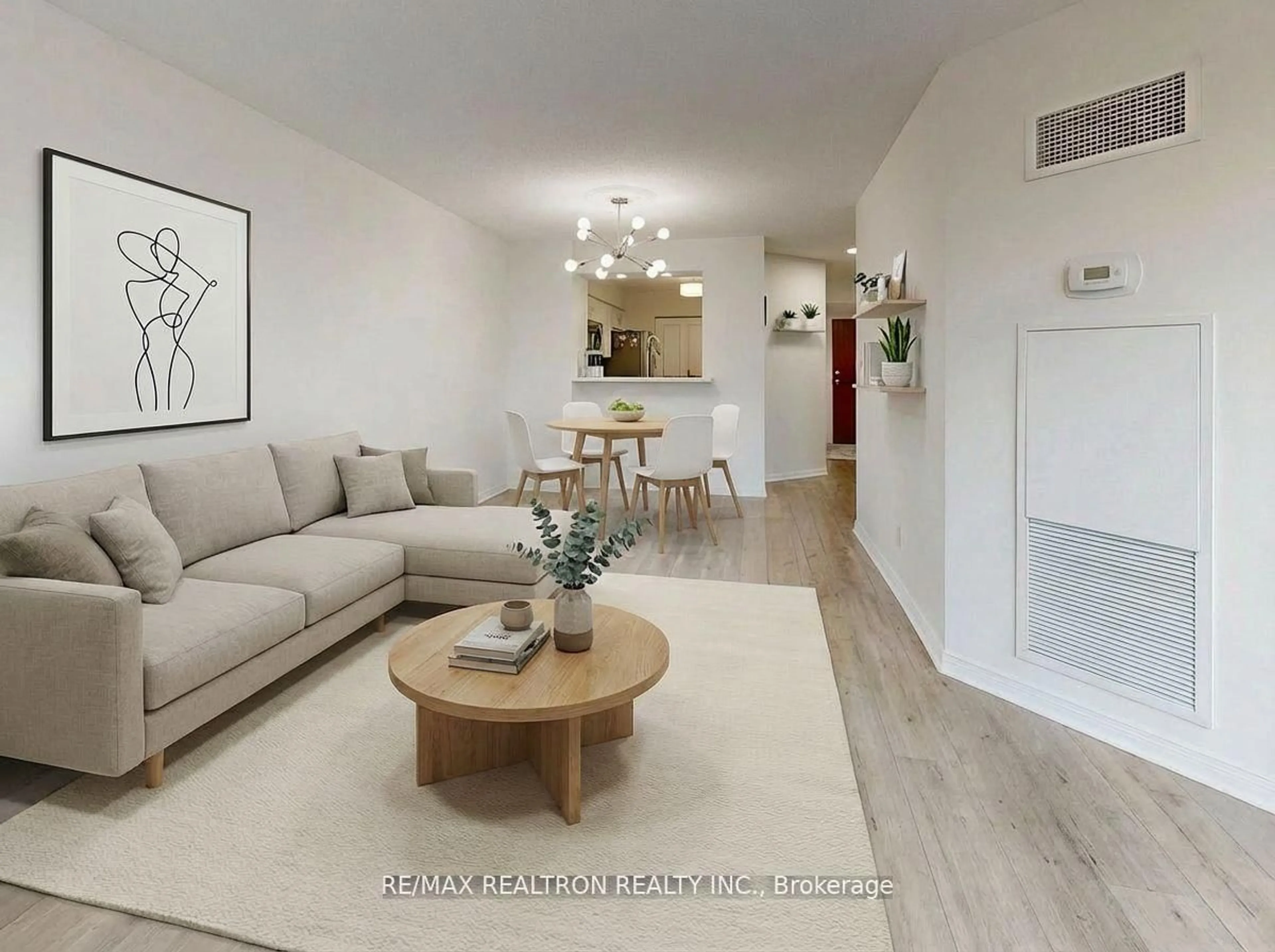 Living room with furniture, wood/laminate floor for 120 Promenade Circ #406, Vaughan Ontario L4J 7W9