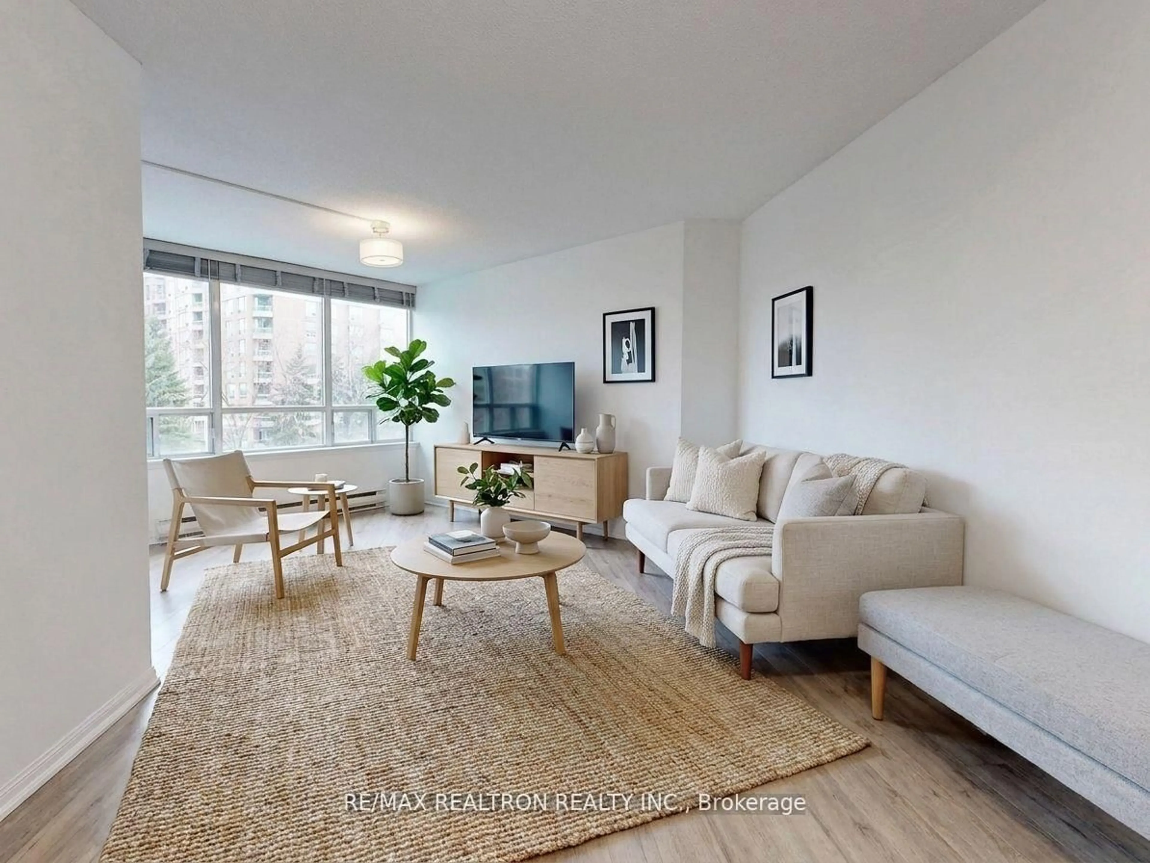 Living room with furniture, unknown for 120 Promenade Circ #406, Vaughan Ontario L4J 7W9