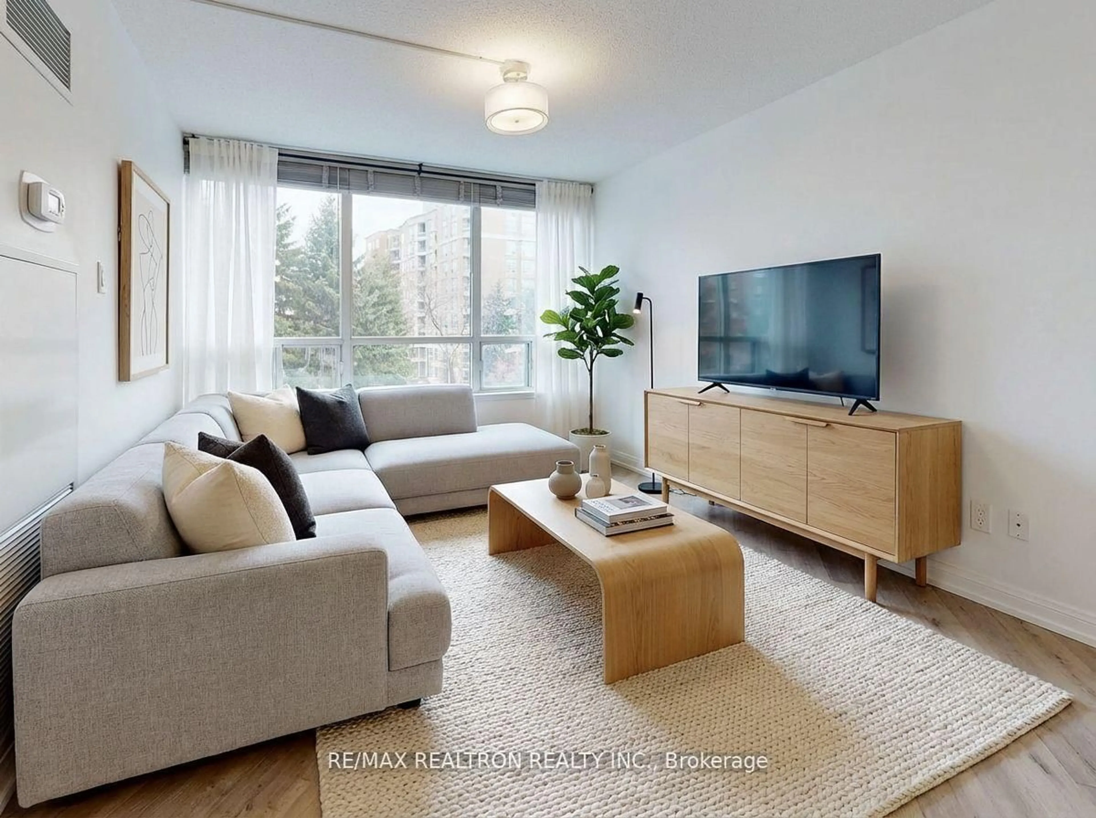 Living room with furniture, unknown for 120 Promenade Circ #406, Vaughan Ontario L4J 7W9