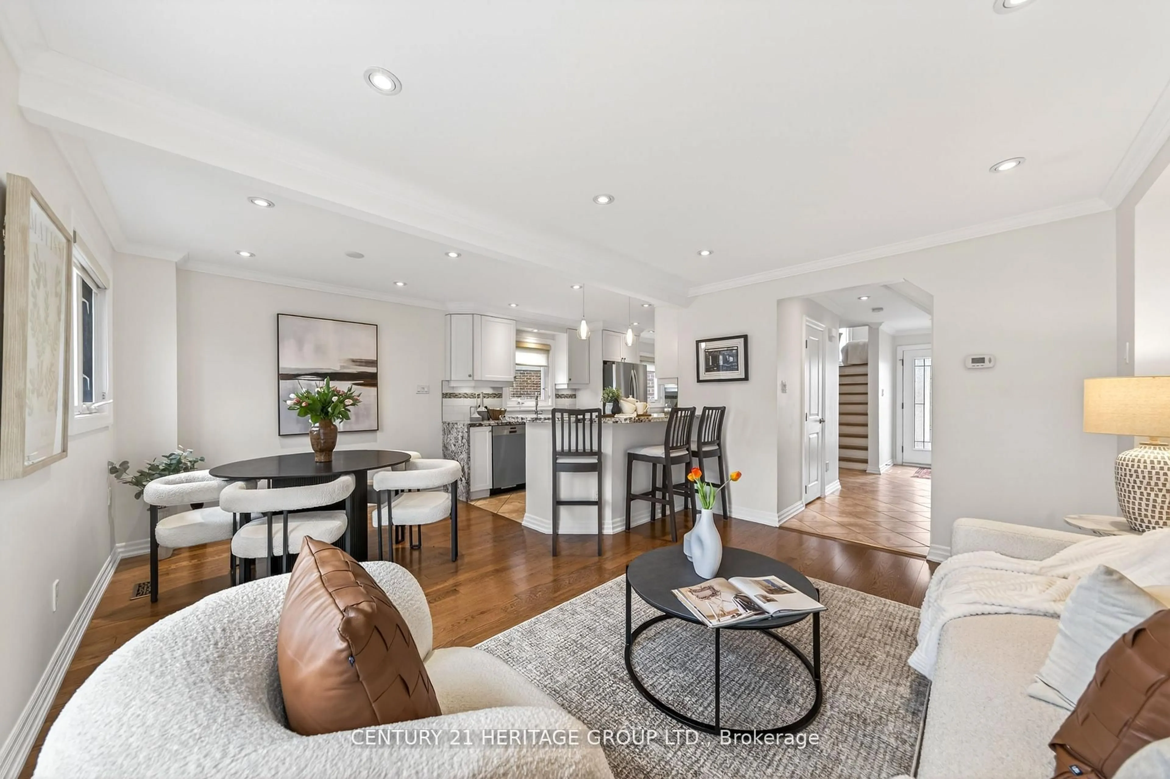 Living room with furniture, wood/laminate floor for 64 Coventry Crt, Richmond Hill Ontario L4C 8B7