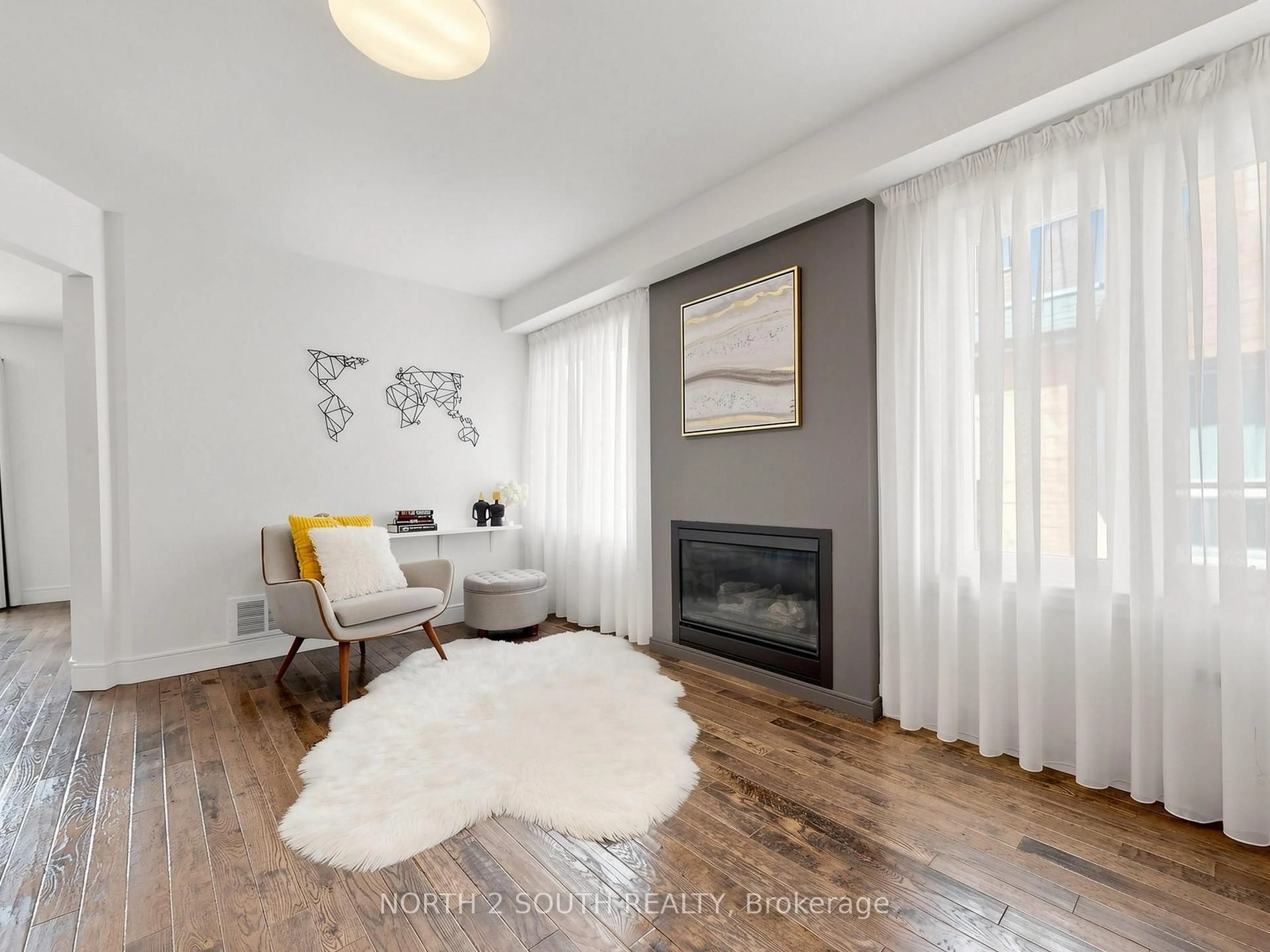 Living room with furniture, wood/laminate floor for 109 Pinedale Gate #94, Vaughan Ontario L4L 8X3