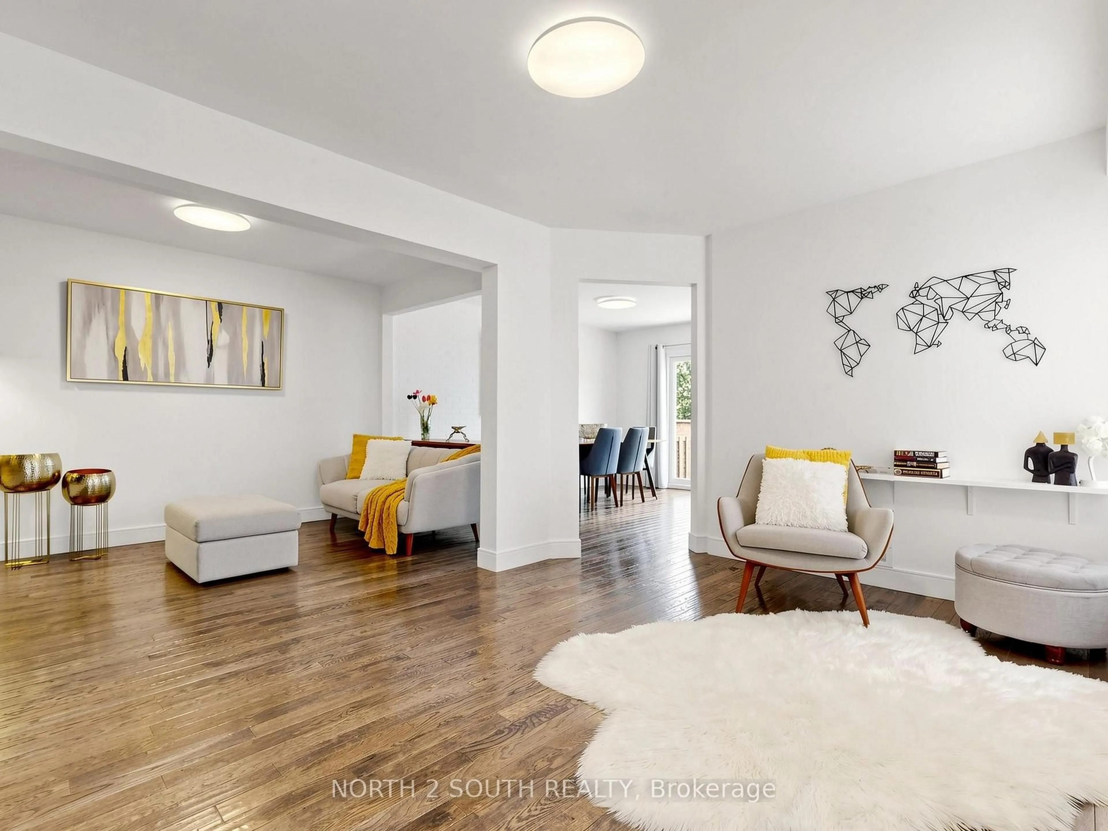 Living room with furniture, wood/laminate floor for 109 Pinedale Gate #94, Vaughan Ontario L4L 8X3