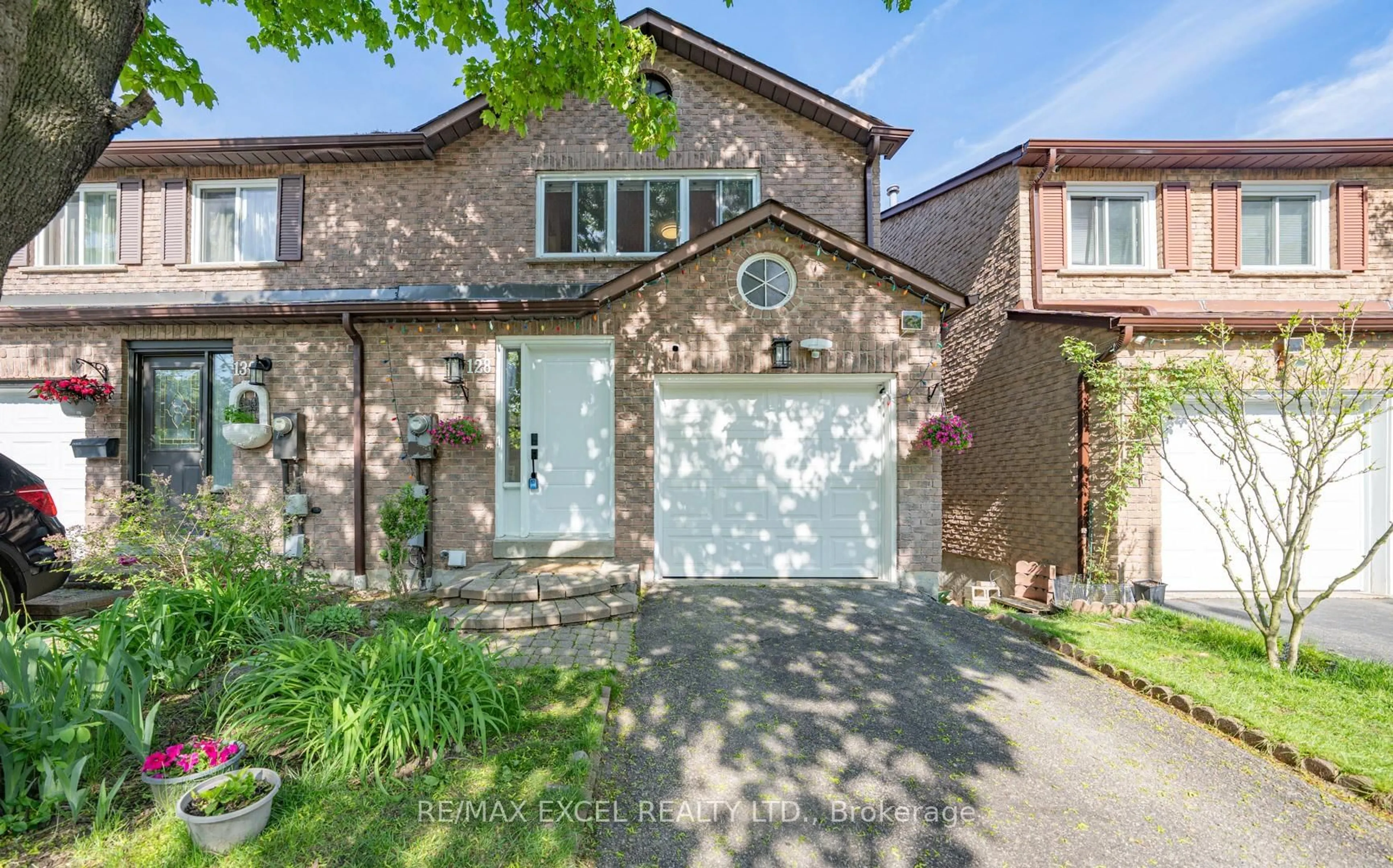 Home with brick exterior material, street for 128 Cottonwood Crt, Markham Ontario L3T 5X1