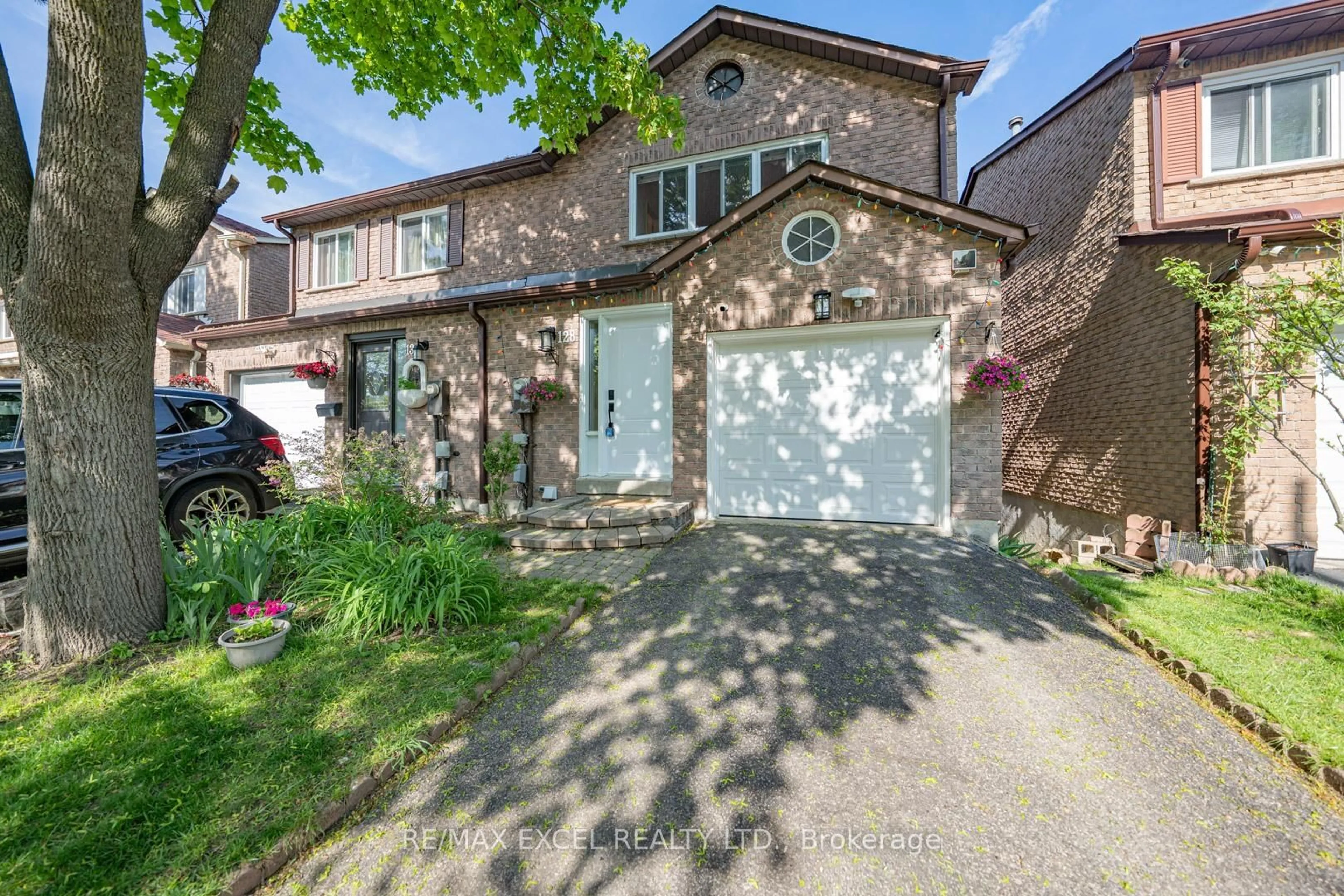 Home with brick exterior material, street for 128 Cottonwood Crt, Markham Ontario L3T 5X1