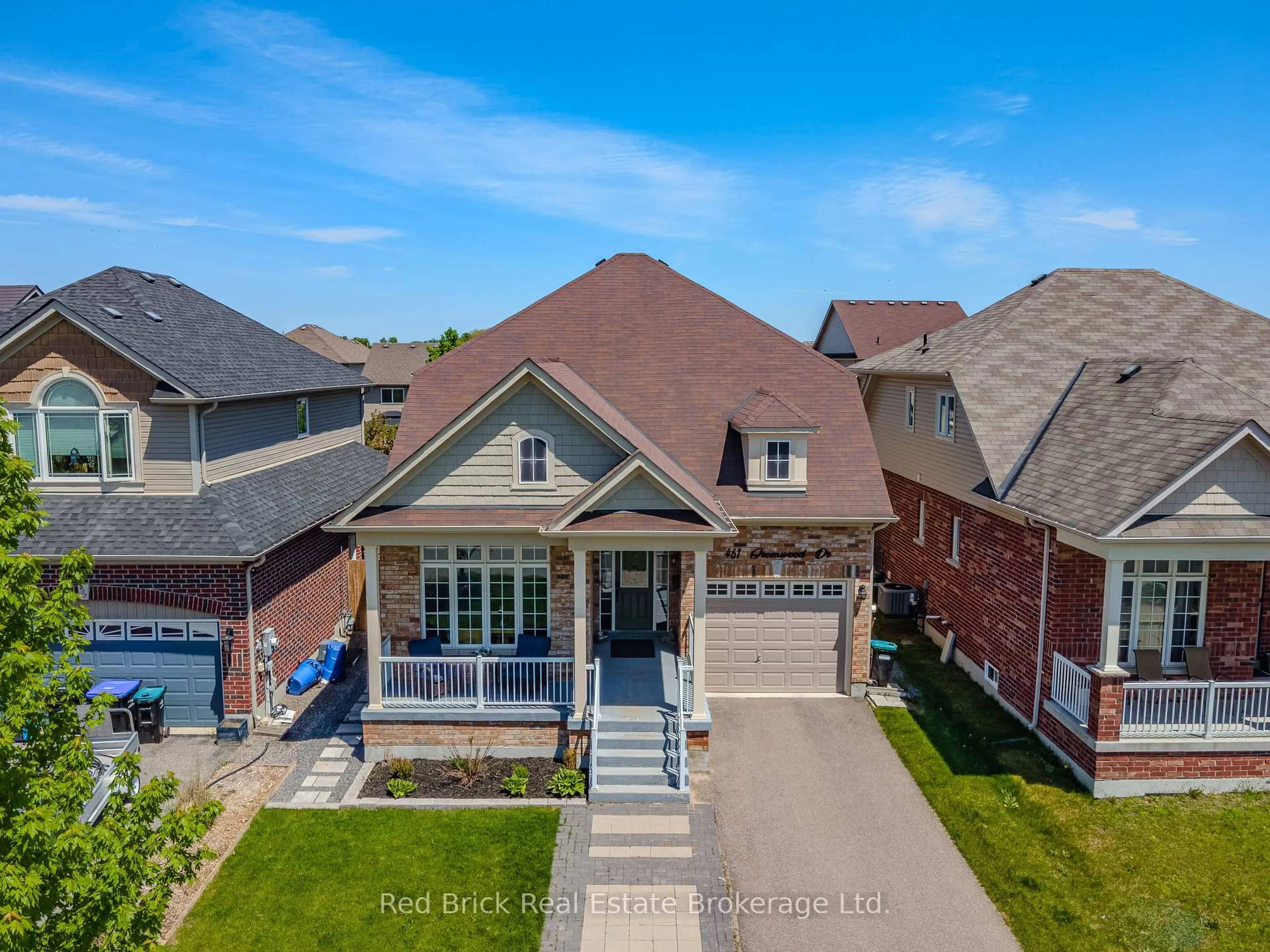 A pic from outside/outdoor area/front of a property/back of a property/a pic from drone, street for 461 Greenwood Dr, Essa Ontario L3W 0R4