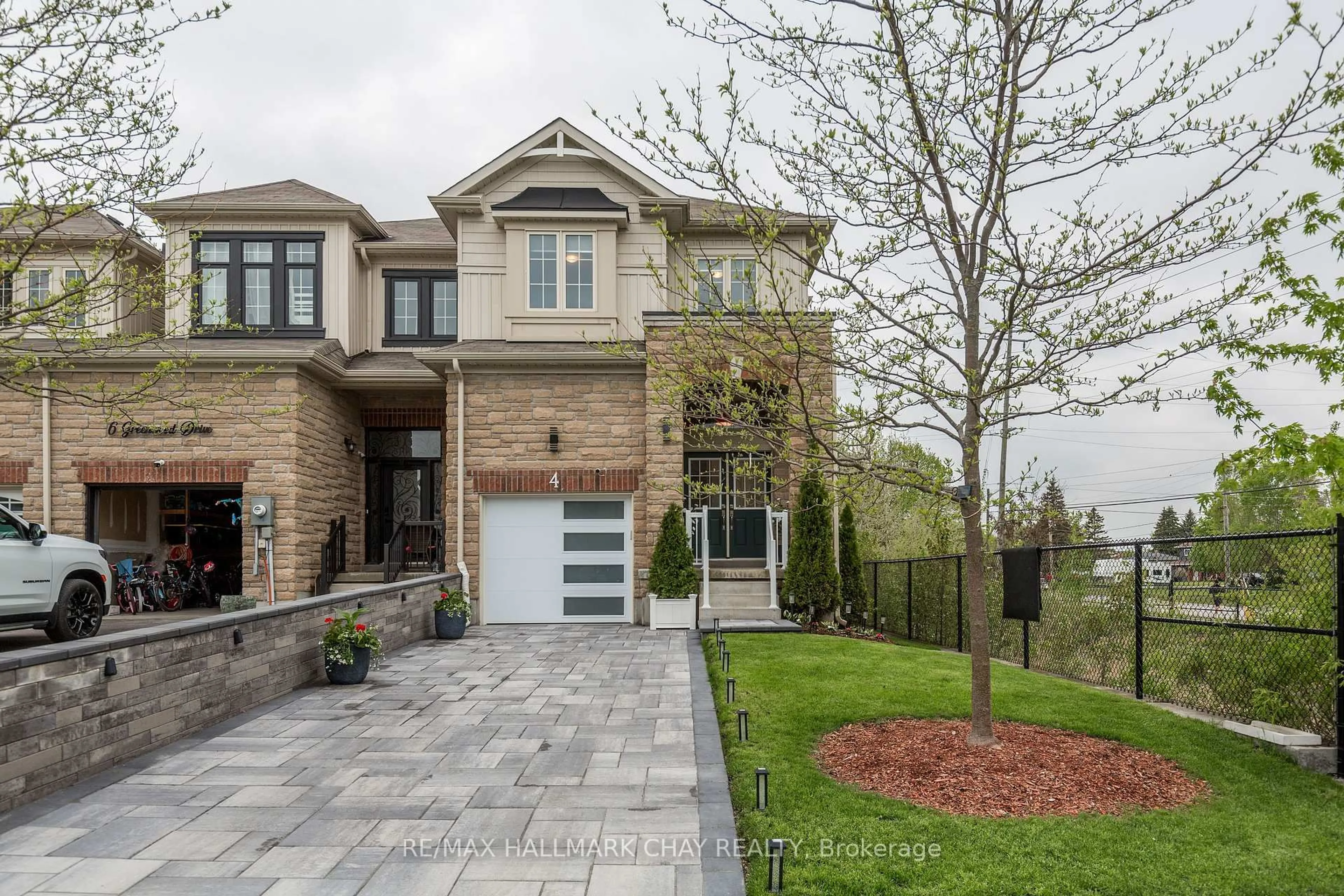 Home with brick exterior material, street for 4 Greenwood Dr, Essa Ontario L3W 0N5