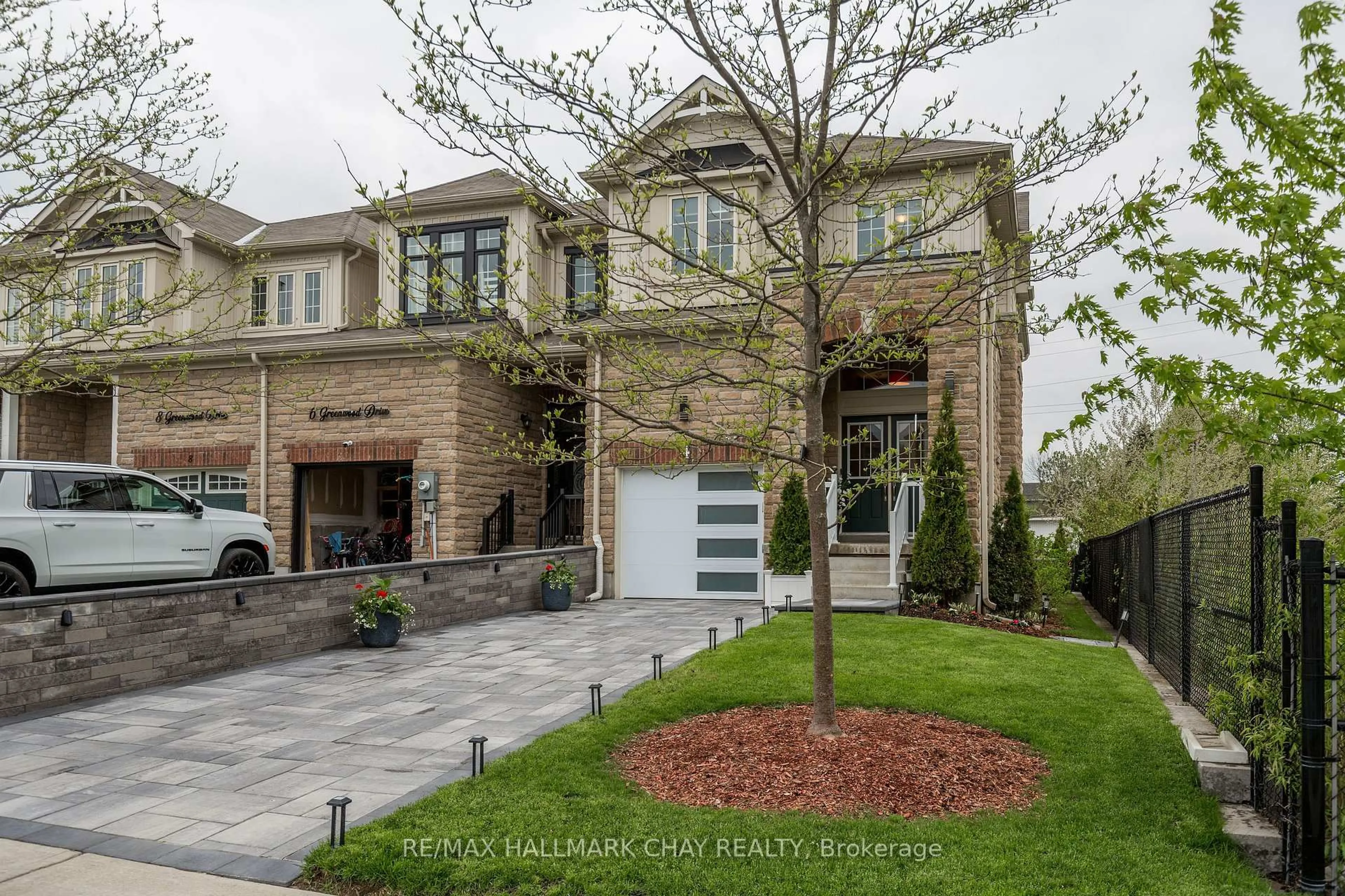 Home with brick exterior material, street for 4 Greenwood Dr, Essa Ontario L3W 0N5