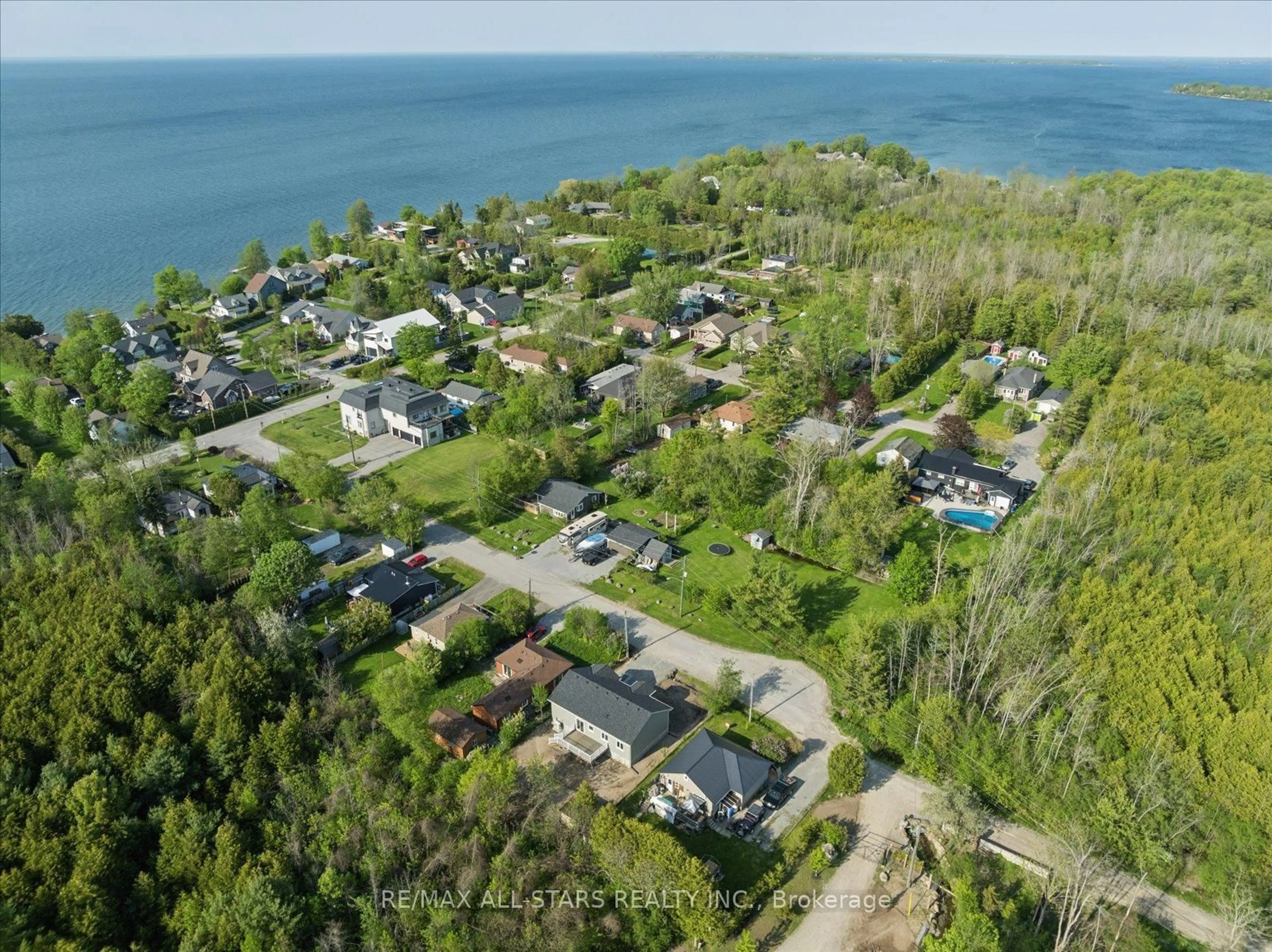 A pic from outside/outdoor area/front of a property/back of a property/a pic from drone, water/lake/river/ocean view for 26 O'Dell Lane, Georgina Ontario L0E 1S0
