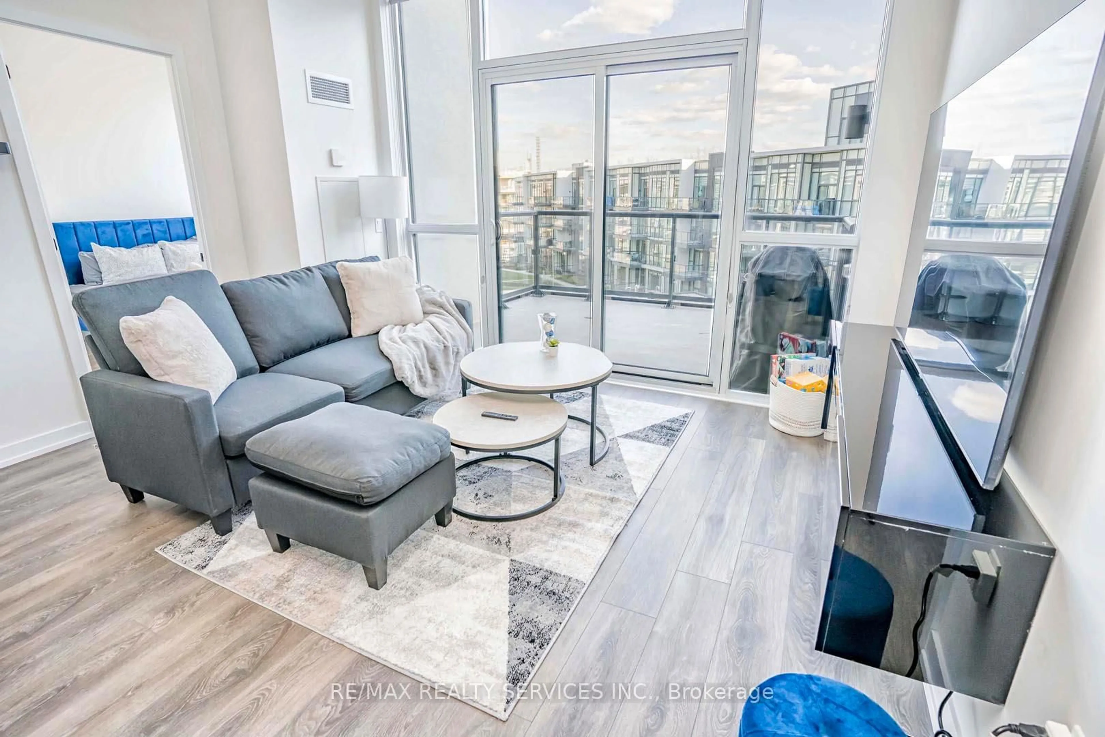 Living room with furniture, unknown for 415 Sea Ray Ave #403, Innisfil Ontario L9S 0R5