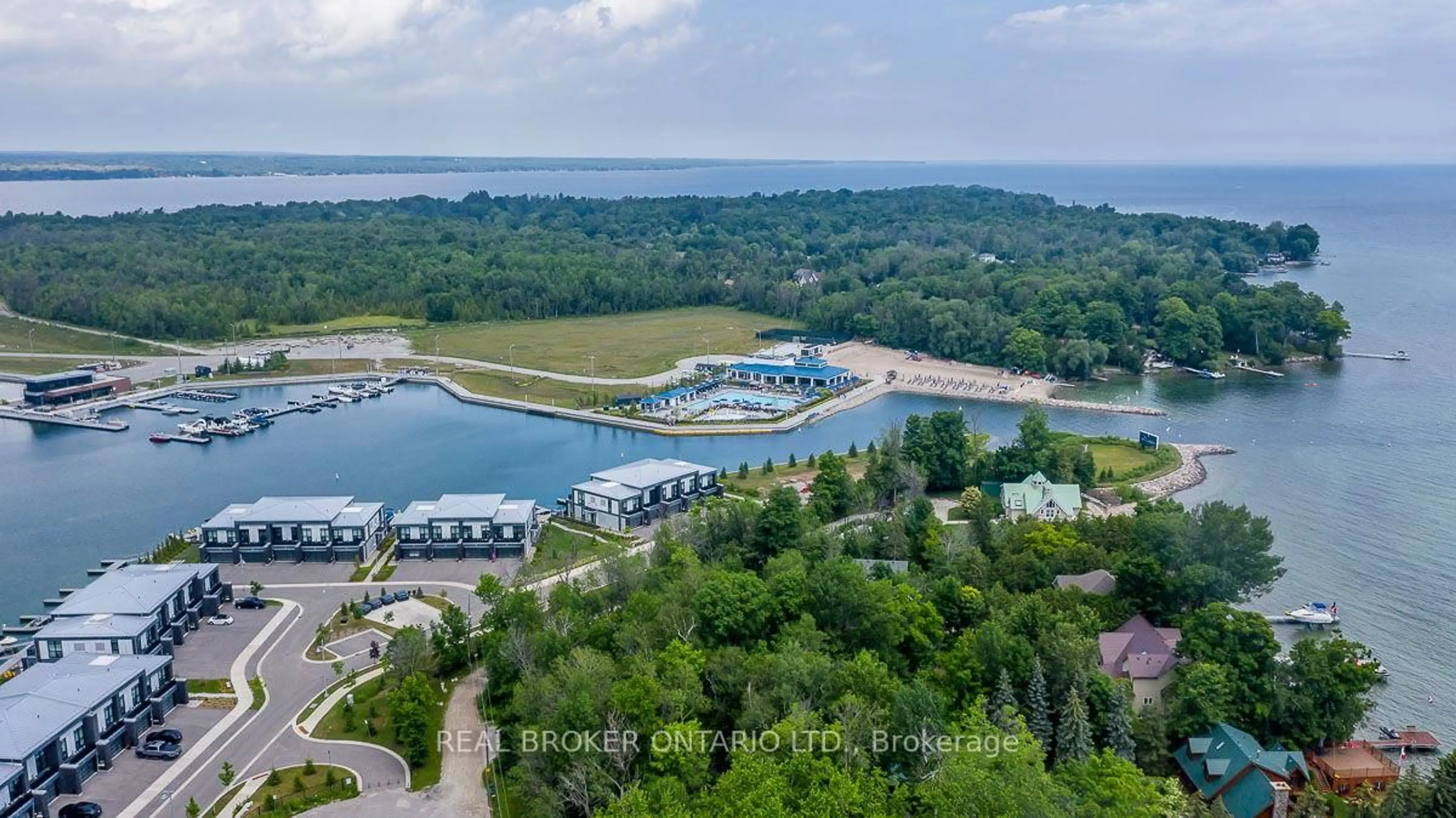 A pic from outside/outdoor area/front of a property/back of a property/a pic from drone, water/lake/river/ocean view for 241 Sea Ray Ave #A303, Innisfil Ontario L9S 2P7