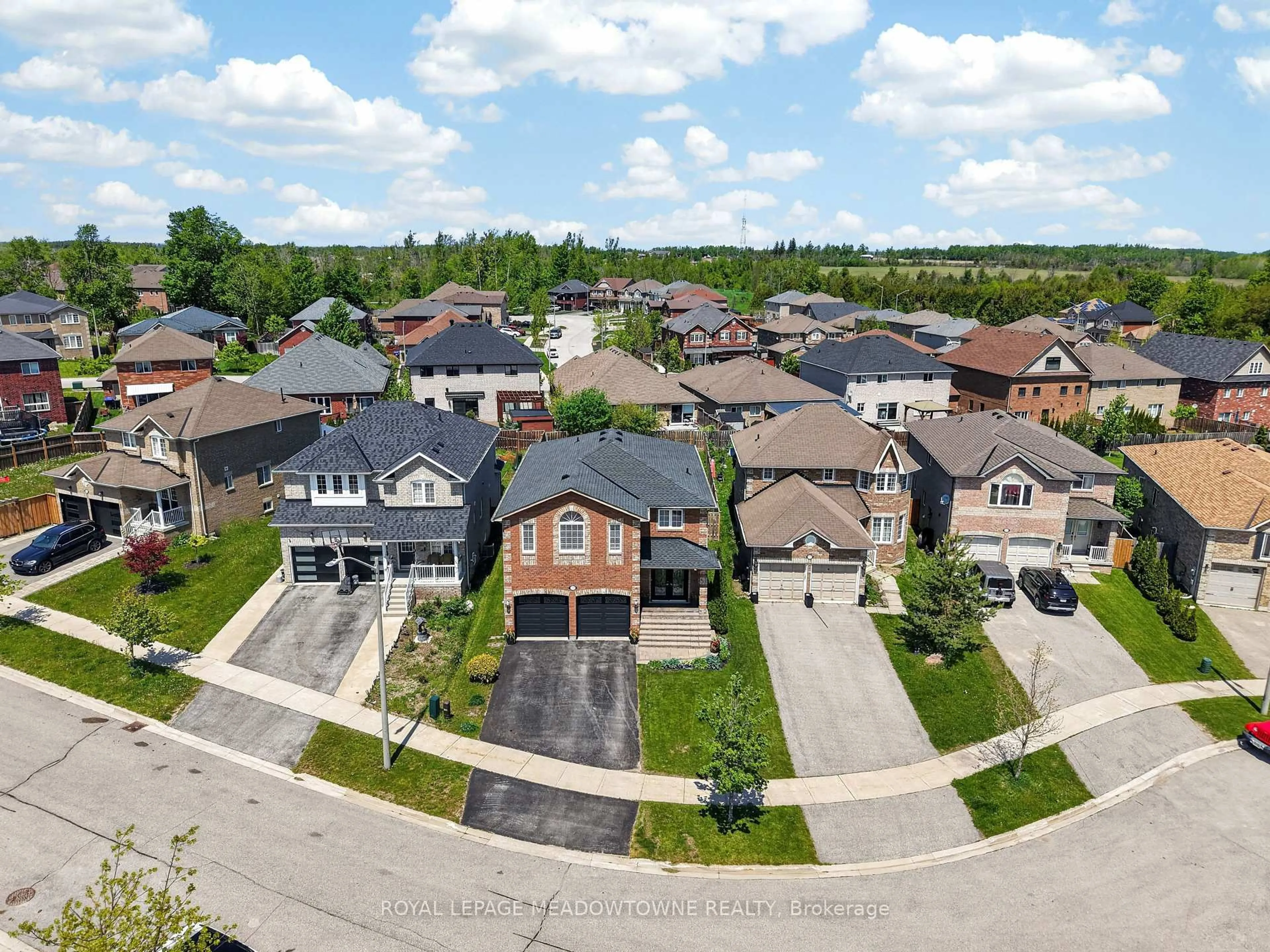 A pic from outside/outdoor area/front of a property/back of a property/a pic from drone, street for 1452 Bassingthwaite Crt, Innisfil Ontario L9S 0E1