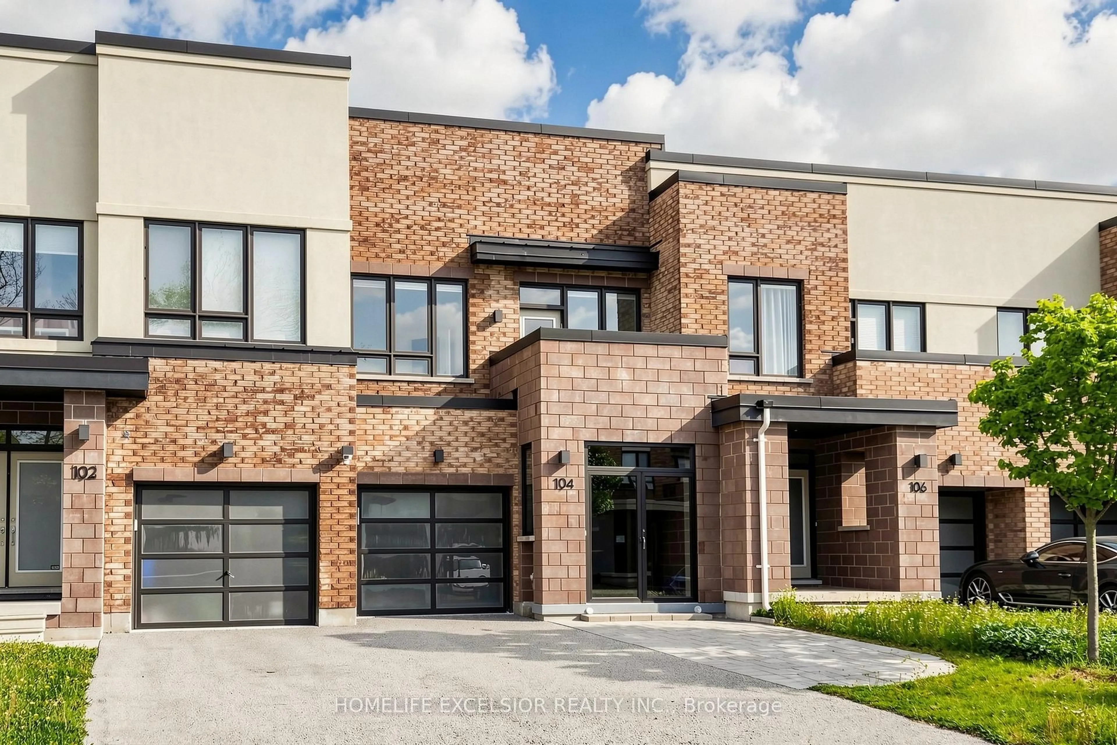 Home with brick exterior material, street for 104 Dariole Dr, Richmond Hill Ontario L4E 0Y8