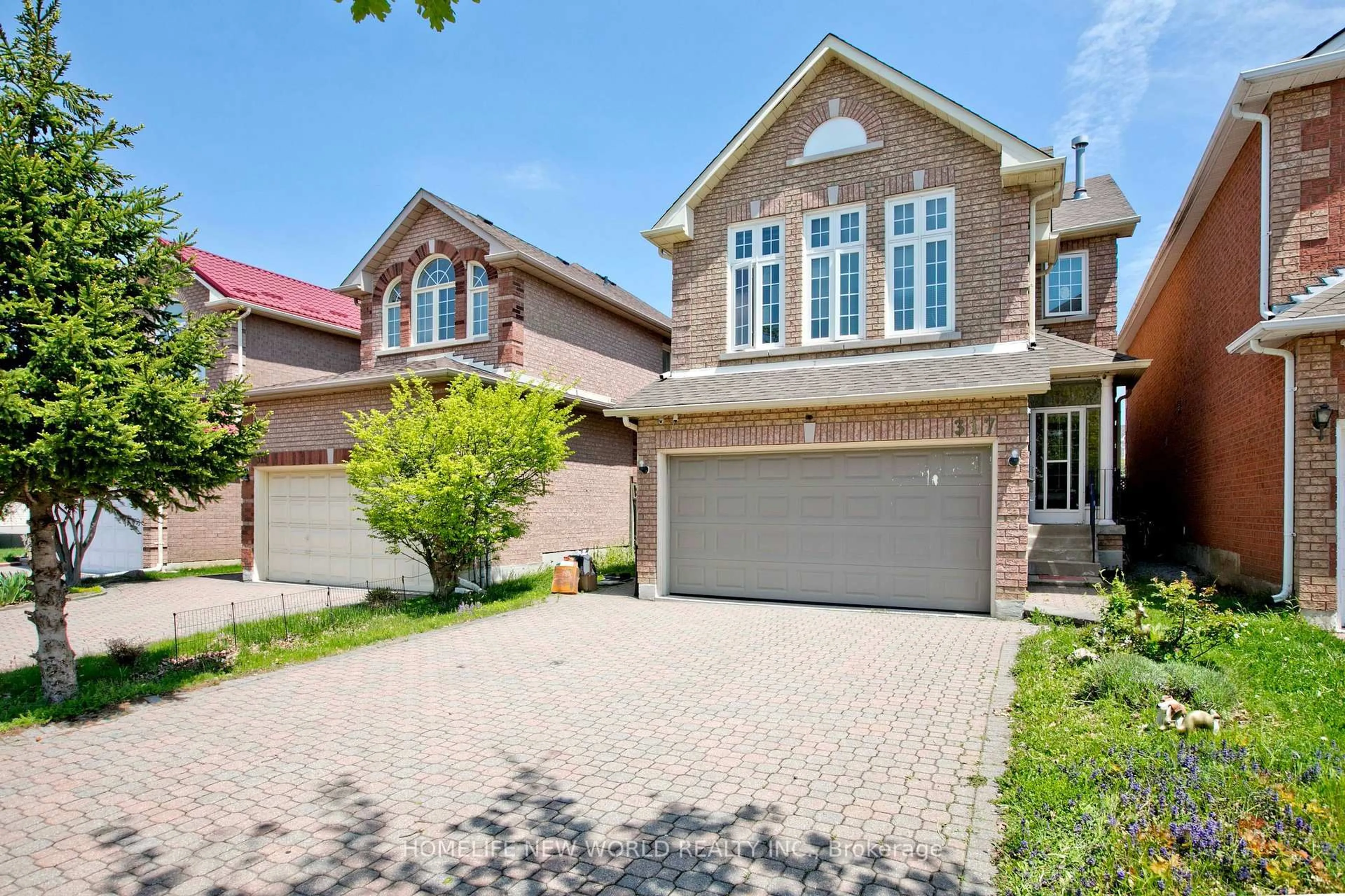 Home with brick exterior material, street for 317 Milliken Meadows Dr, Markham Ontario L3R 0V8