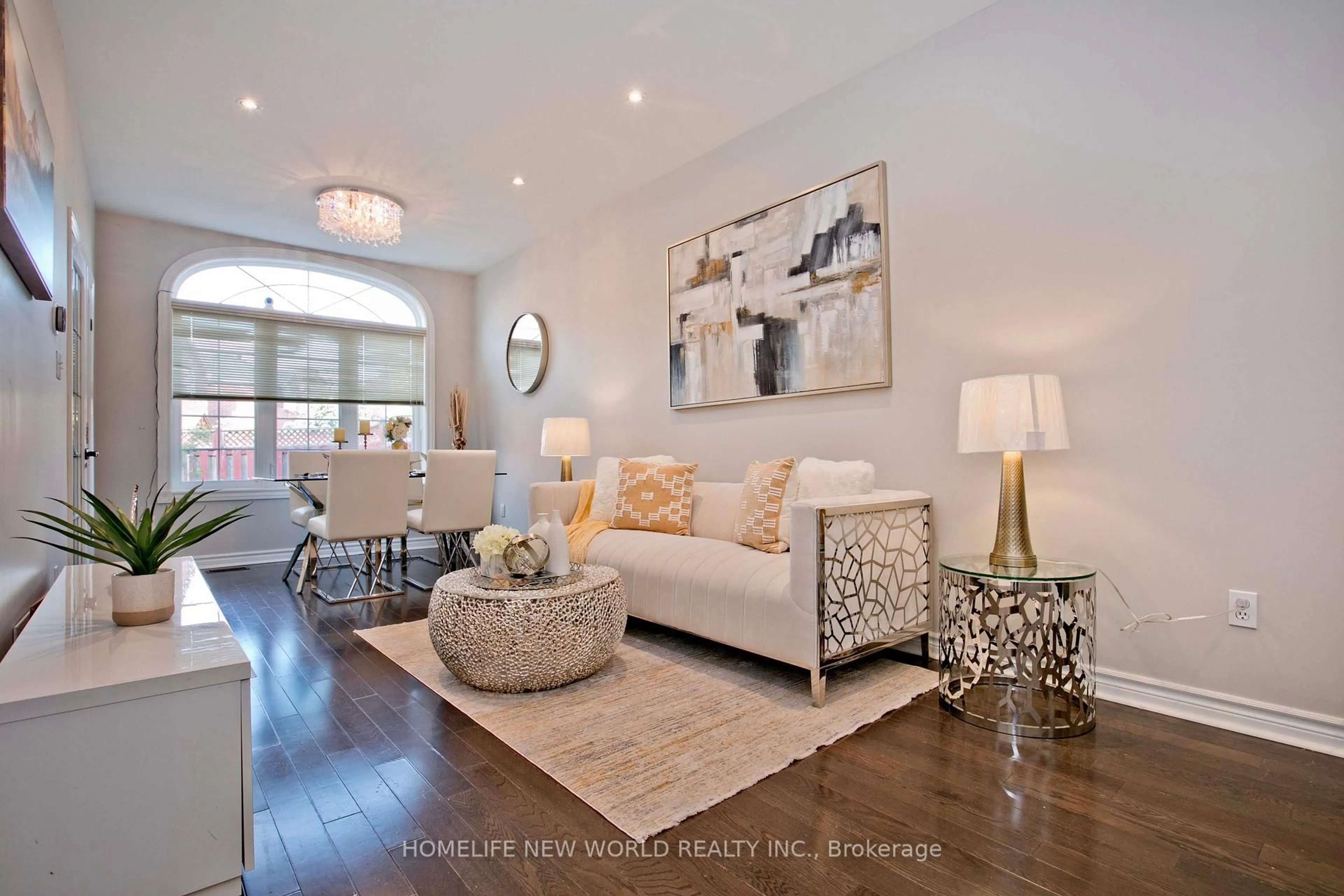 Living room with furniture, wood/laminate floor for 317 Milliken Meadows Dr, Markham Ontario L3R 0V8