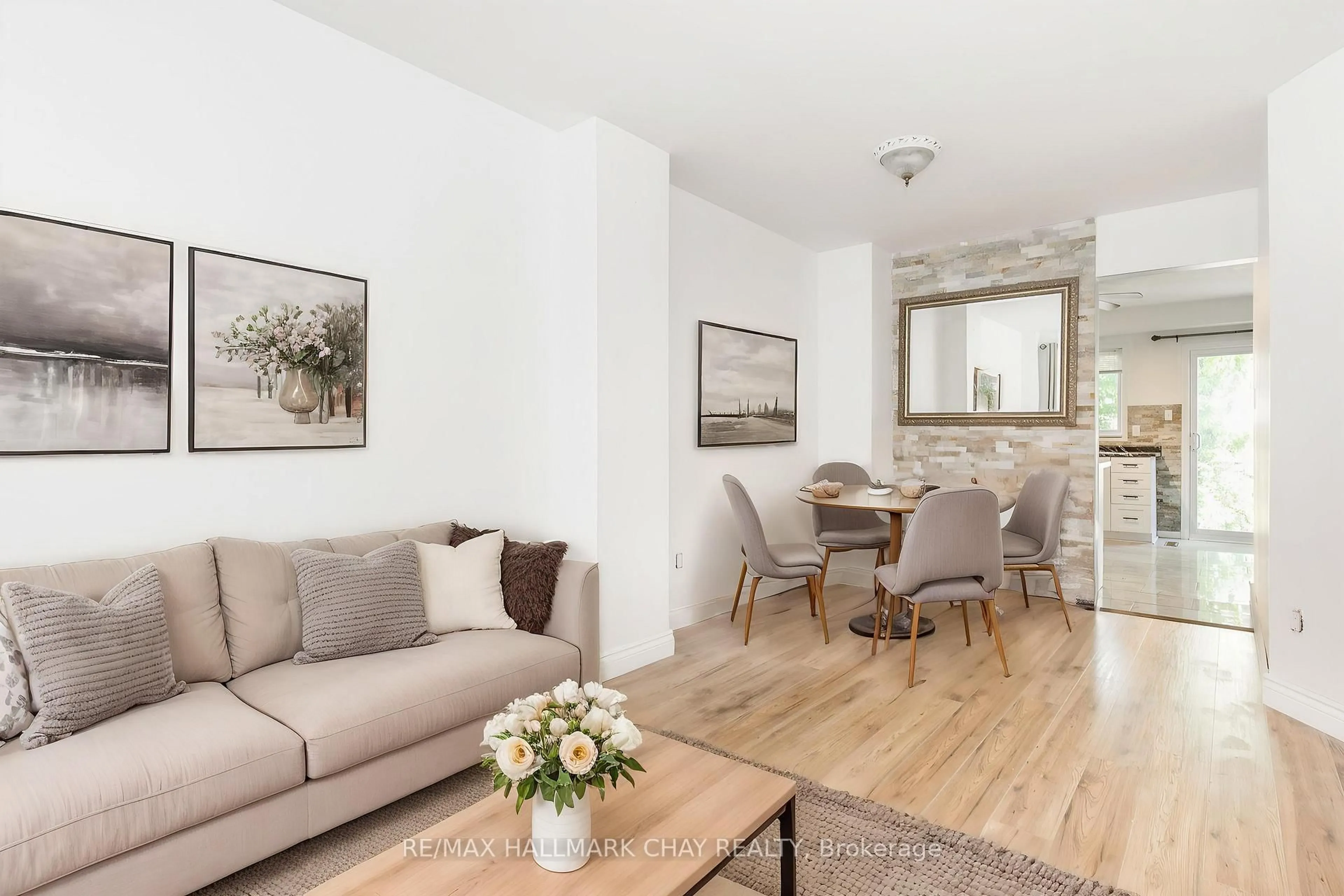 Living room with furniture, wood/laminate floor for 1176 Hill St, Innisfil Ontario L9S 1Y1