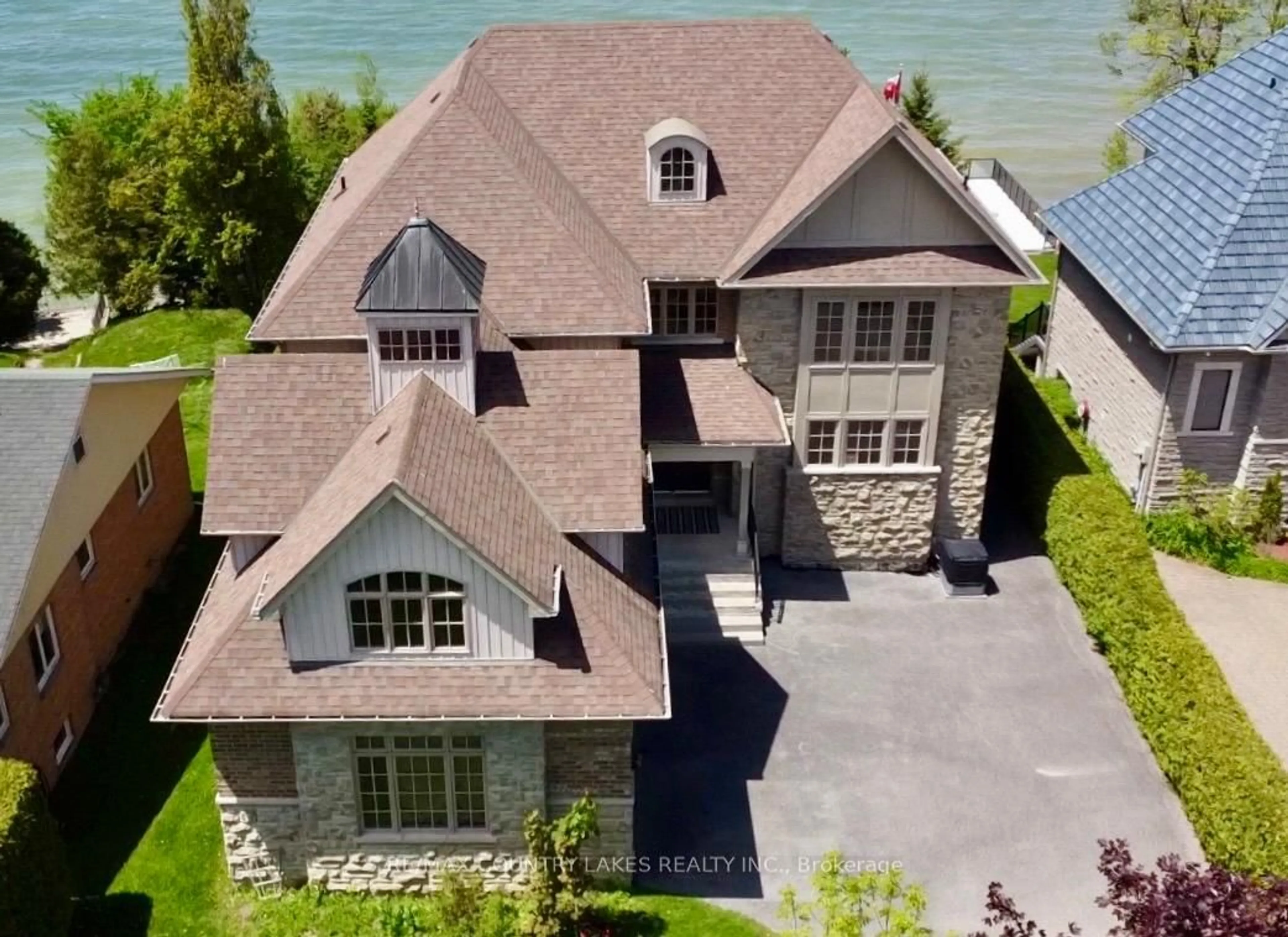 A pic from outside/outdoor area/front of a property/back of a property/a pic from drone, water/lake/river/ocean view for 25630 Maple Beach Rd, Brock Ontario L0K 1A0
