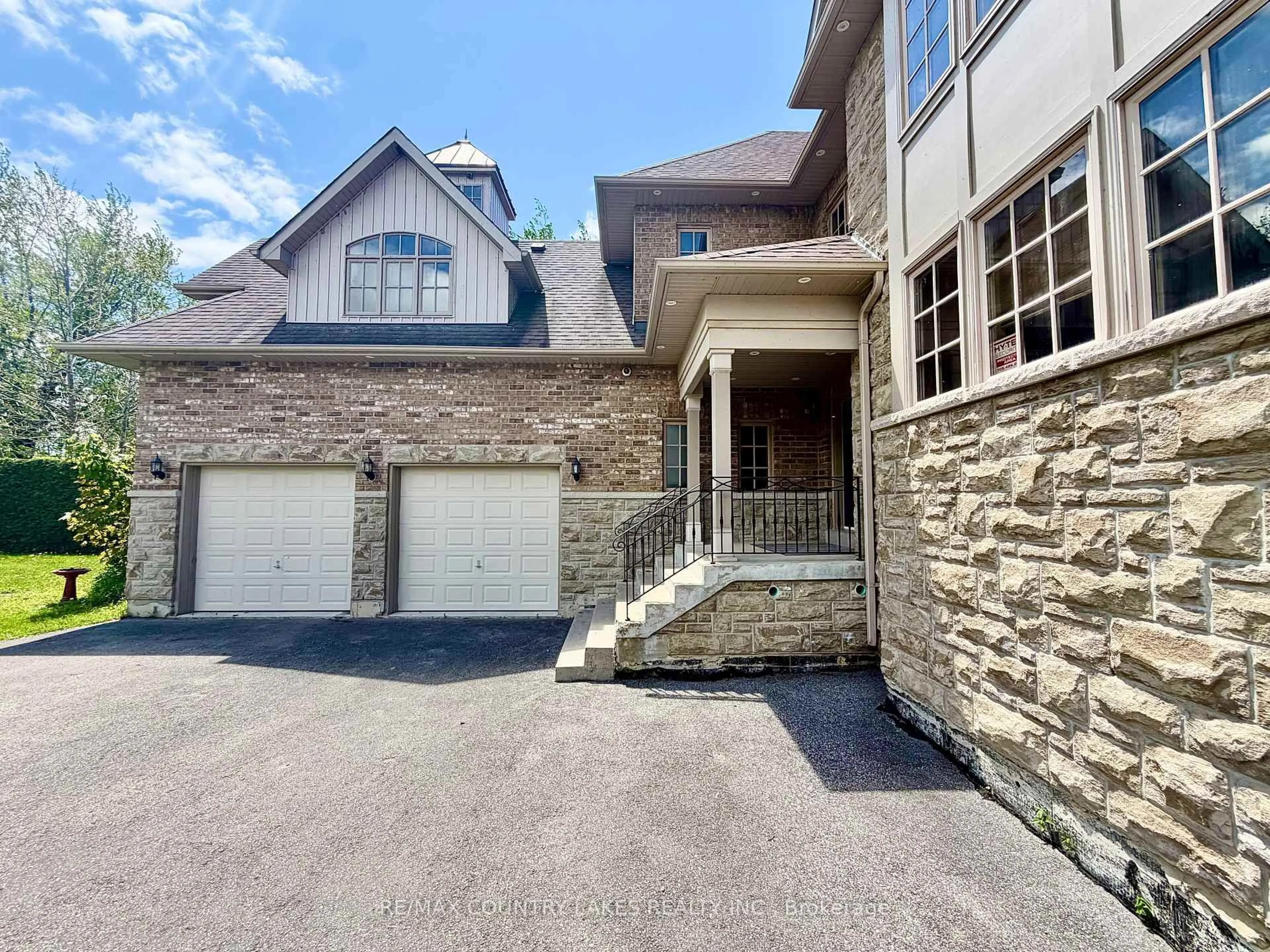 Home with brick exterior material, street for 25630 Maple Beach Rd, Brock Ontario L0K 1A0