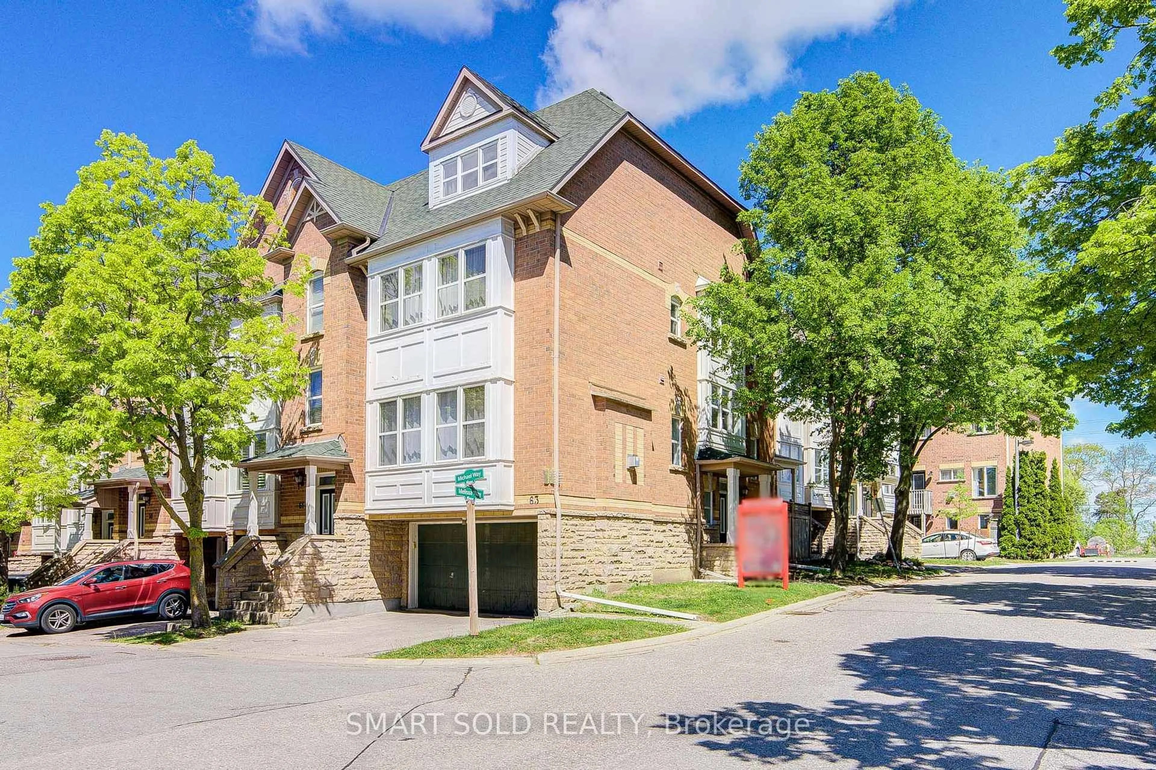 Home with brick exterior material, street for 63 Michael Way, Markham Ontario L3R 5G4