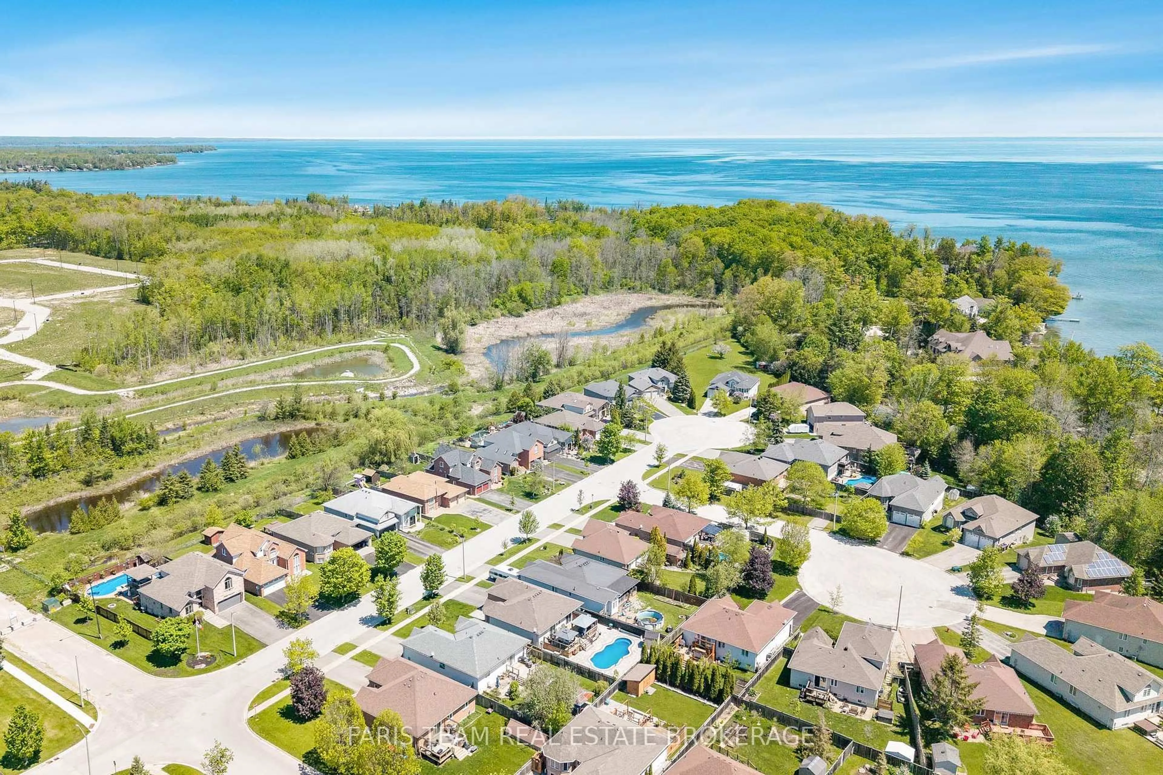 A pic from outside/outdoor area/front of a property/back of a property/a pic from drone, water/lake/river/ocean view for 616 Glen Cedar Cres, Innisfil Ontario L9S 2J4