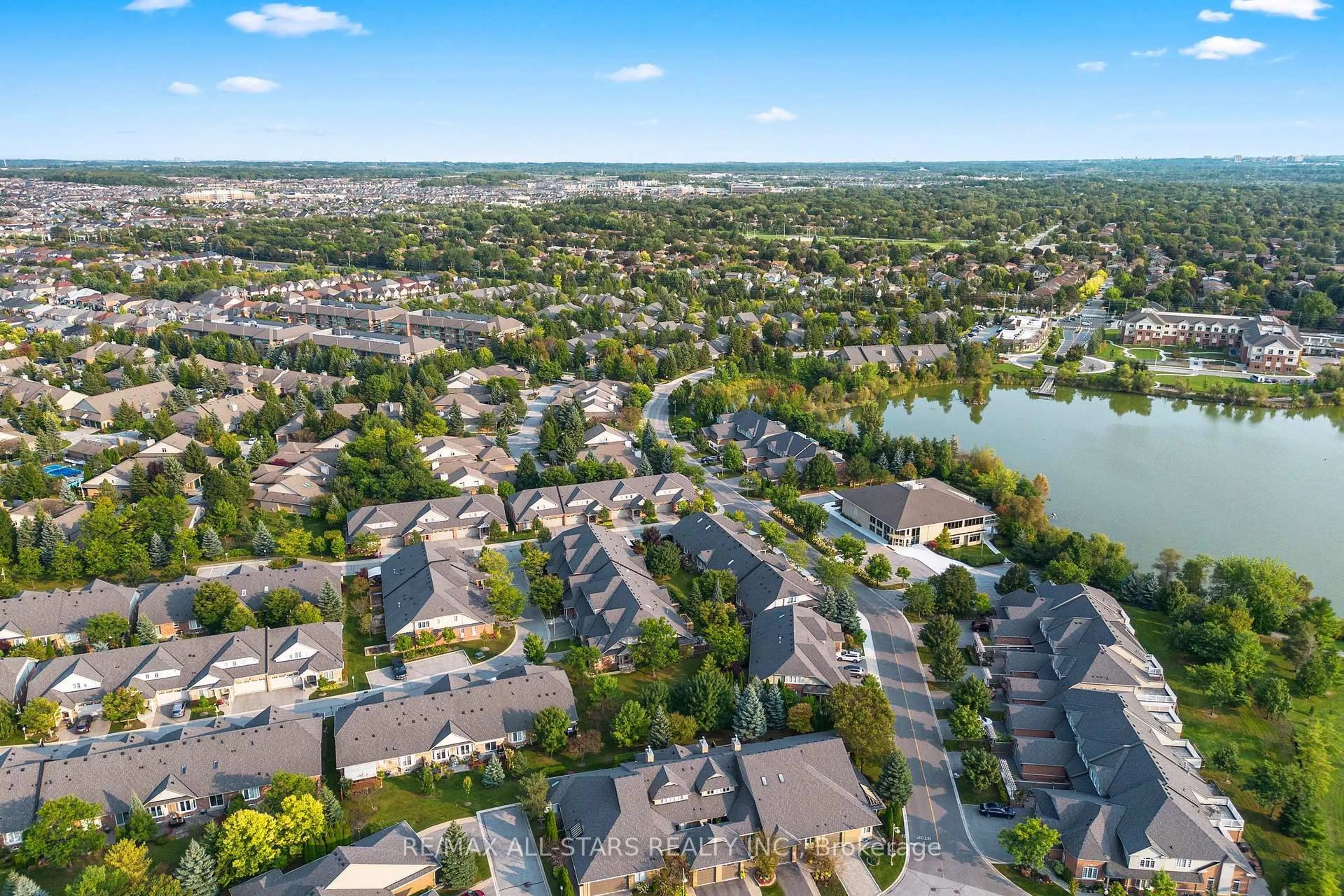 A pic from outside/outdoor area/front of a property/back of a property/a pic from drone, water/lake/river/ocean view for 80 The Boardwalk Way #322, Markham Ontario L6E 1B8