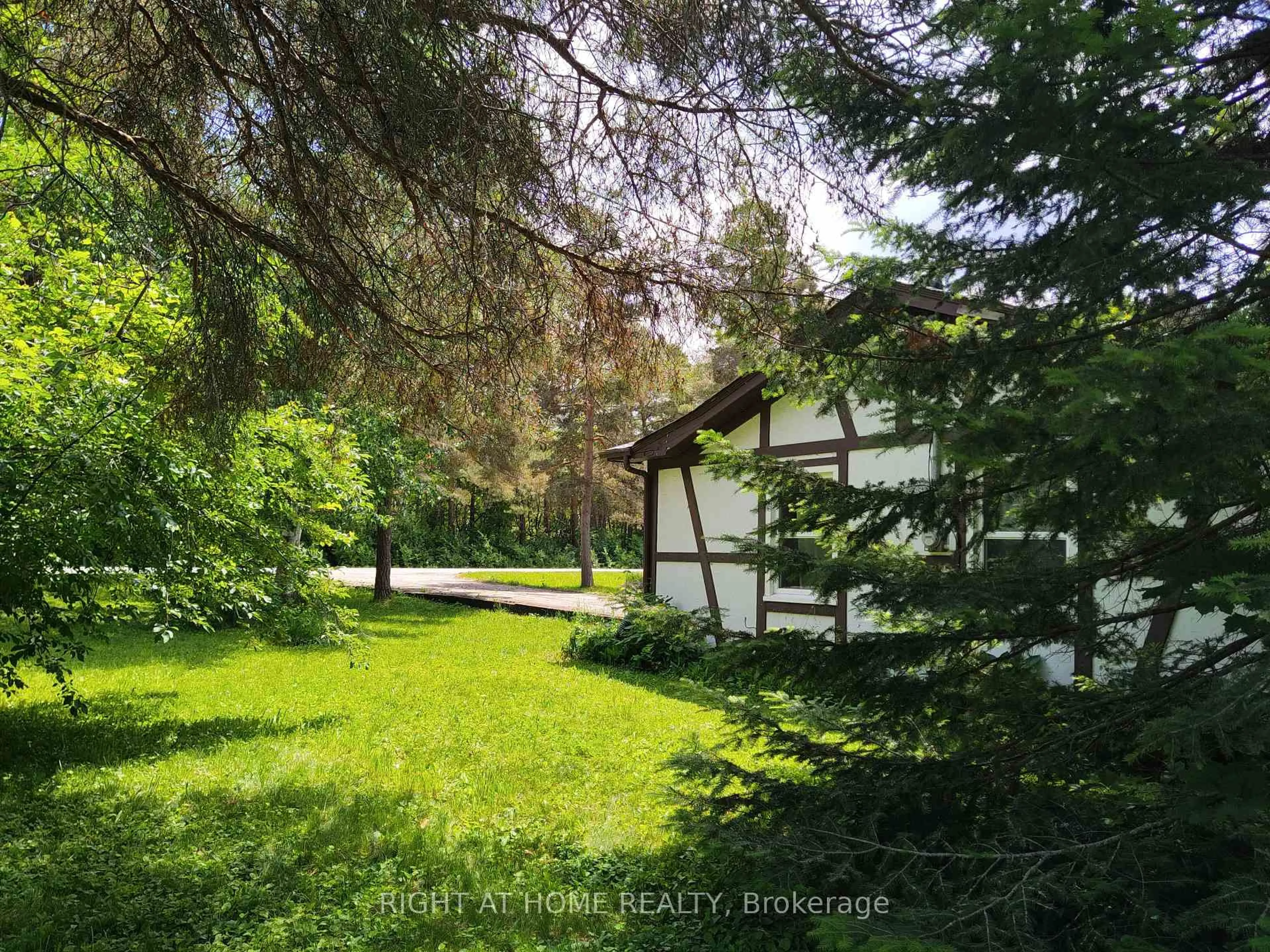 A pic from outside/outdoor area/front of a property/back of a property/a pic from drone, forest/trees view for 110 Ethel Park Dr, Brock Ontario L0K 1A0