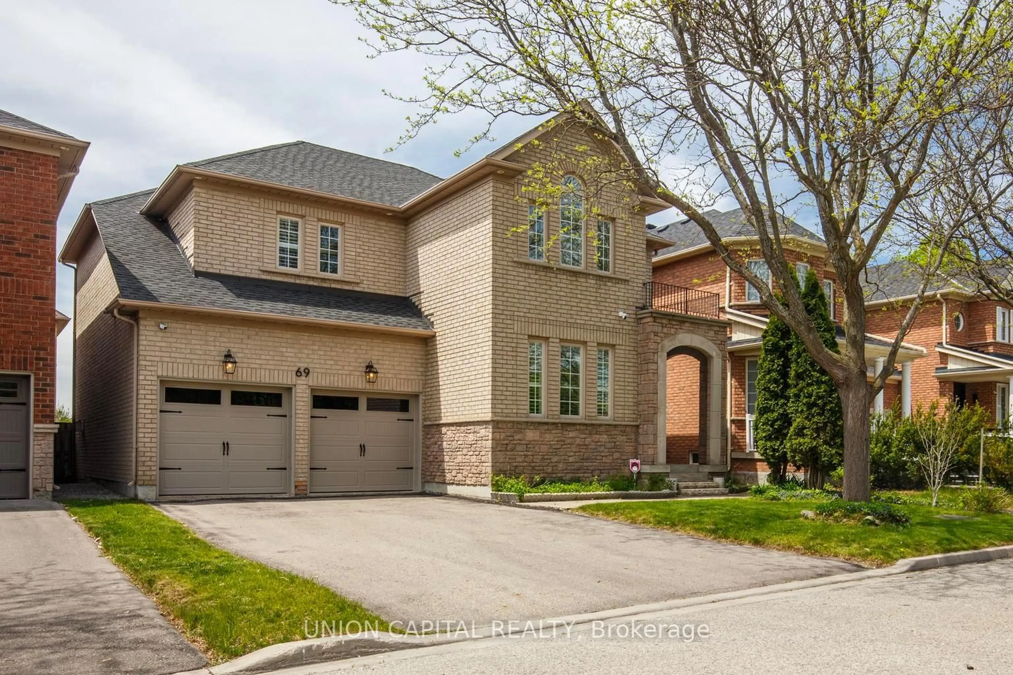 Home with brick exterior material, street for 69 Southbrook Cres, Markham Ontario L6C 2H6