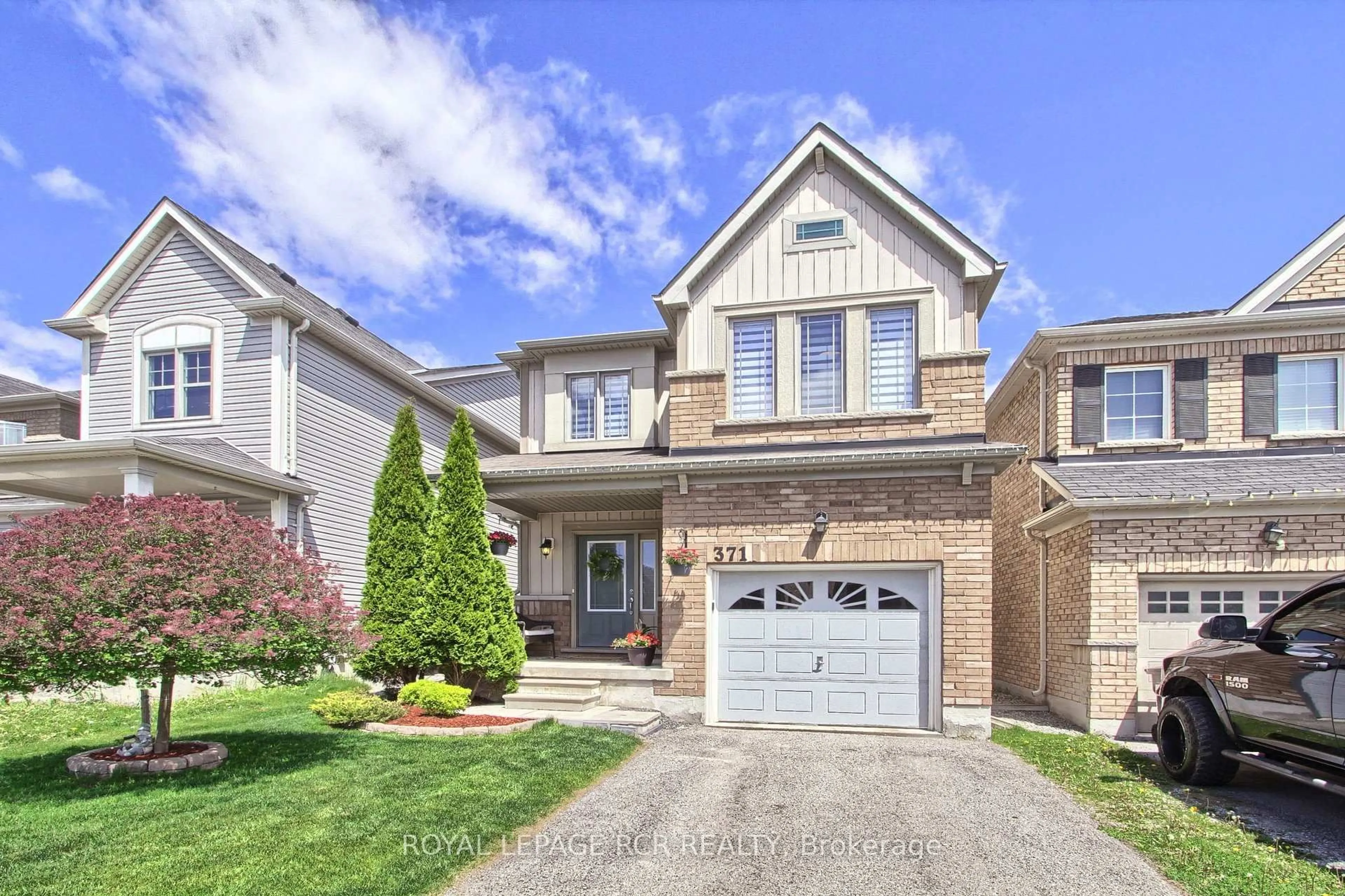 Home with brick exterior material, street for 371 Langford Blvd, Bradford West Gwillimbury Ontario L3Z 0P7