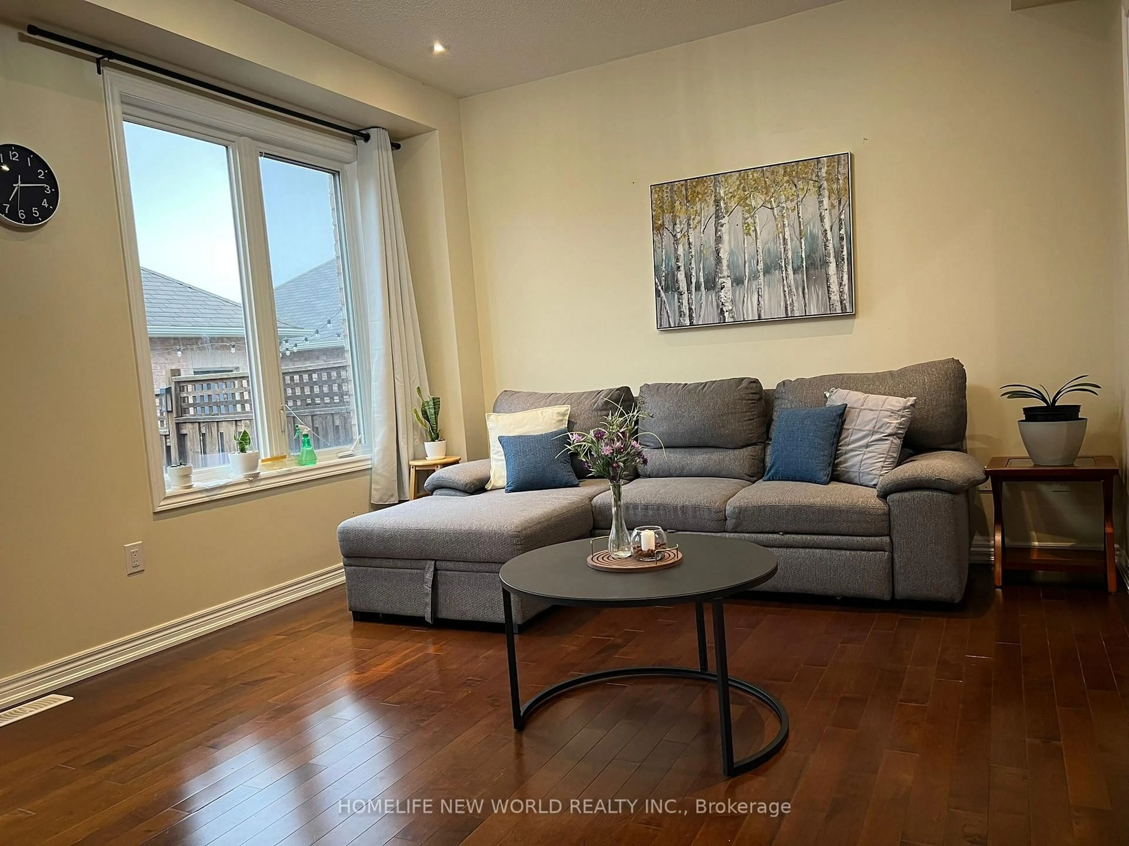 Living room with furniture, wood/laminate floor for 35 Cinemark Ave, Markham Ontario L6B 0W2