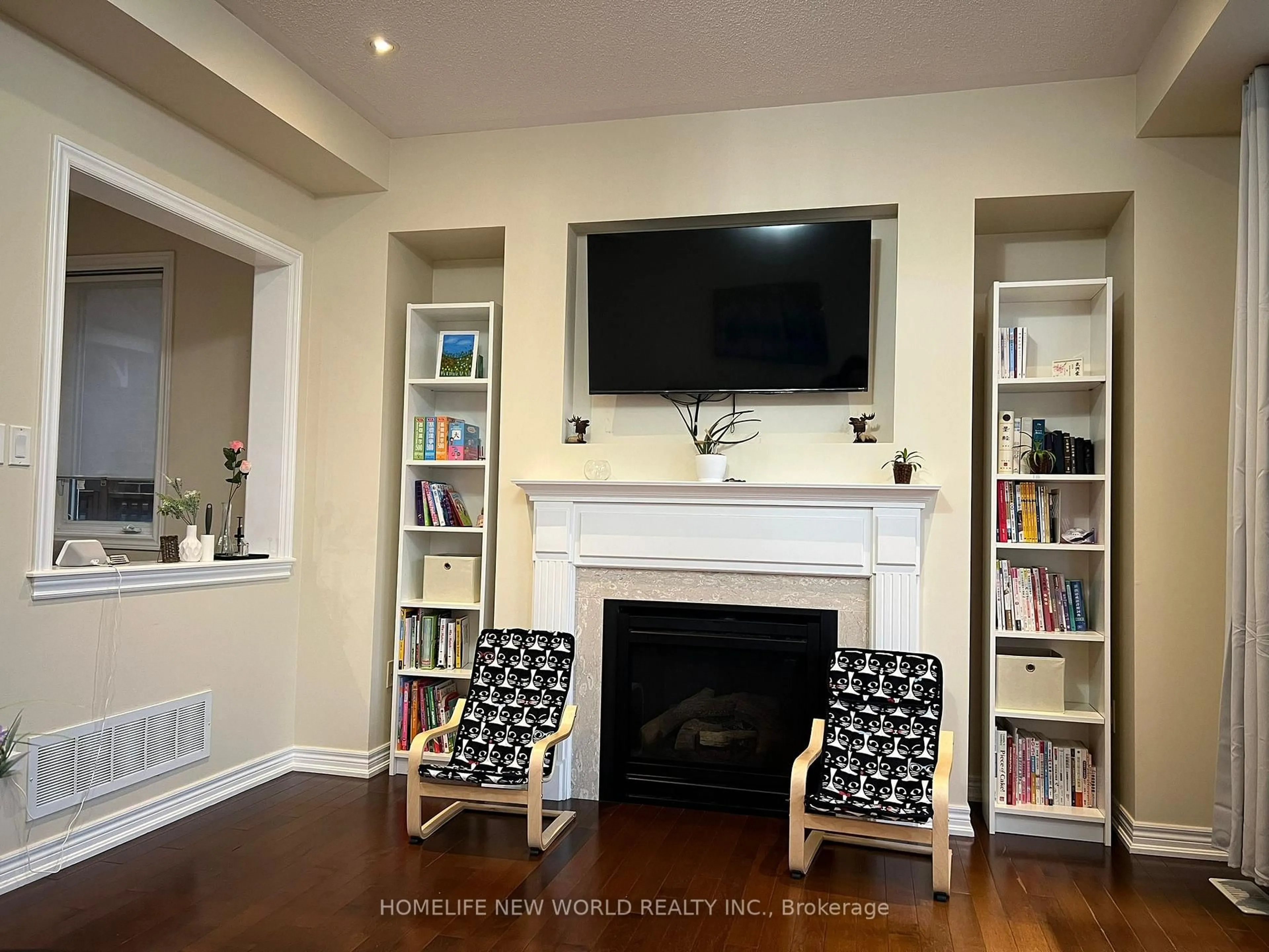 Living room with furniture, wood/laminate floor for 35 Cinemark Ave, Markham Ontario L6B 0W2