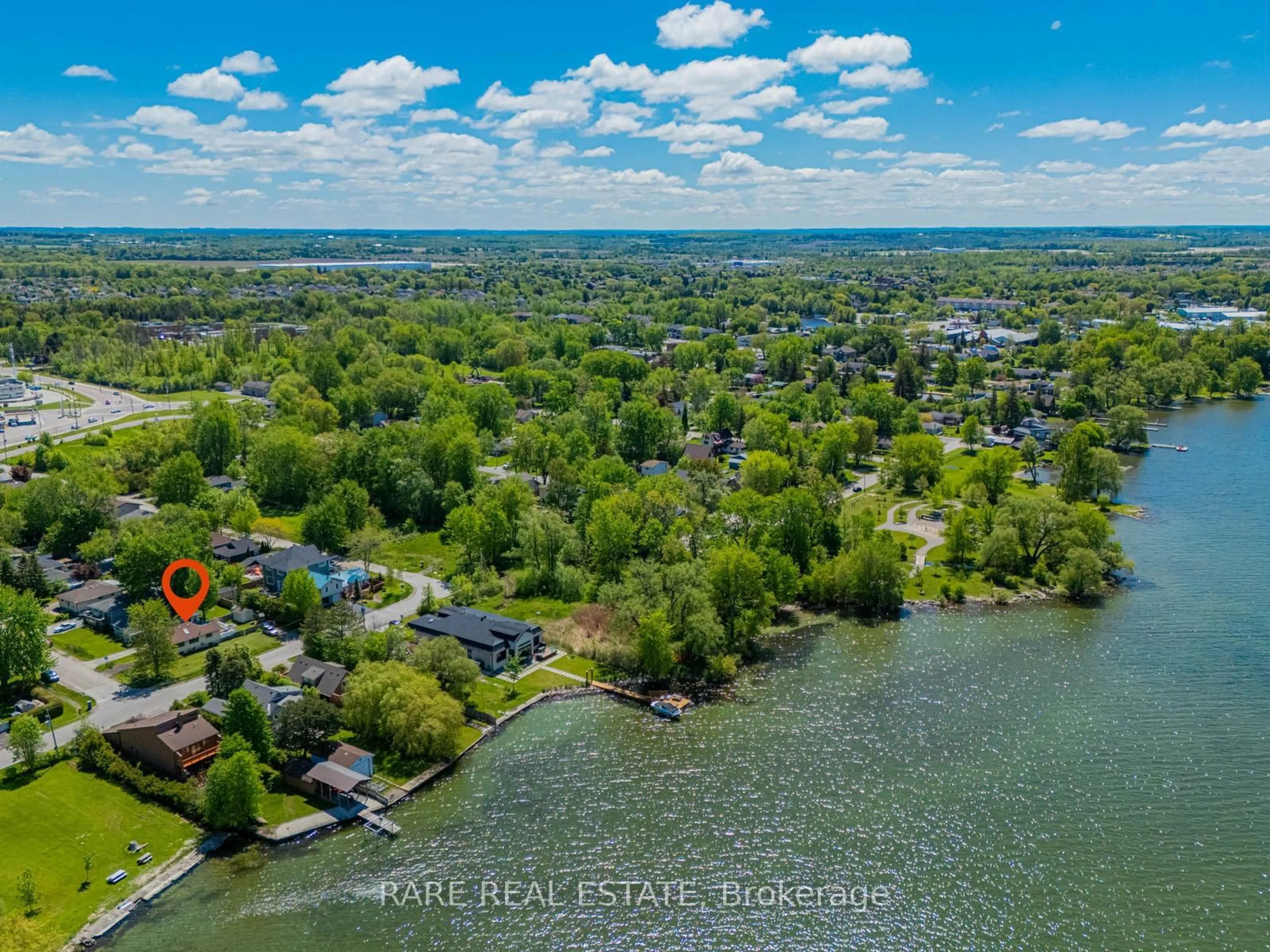 A pic from outside/outdoor area/front of a property/back of a property/a pic from drone, water/lake/river/ocean view for 205 Beach Rd, Georgina Ontario L4P 2L8