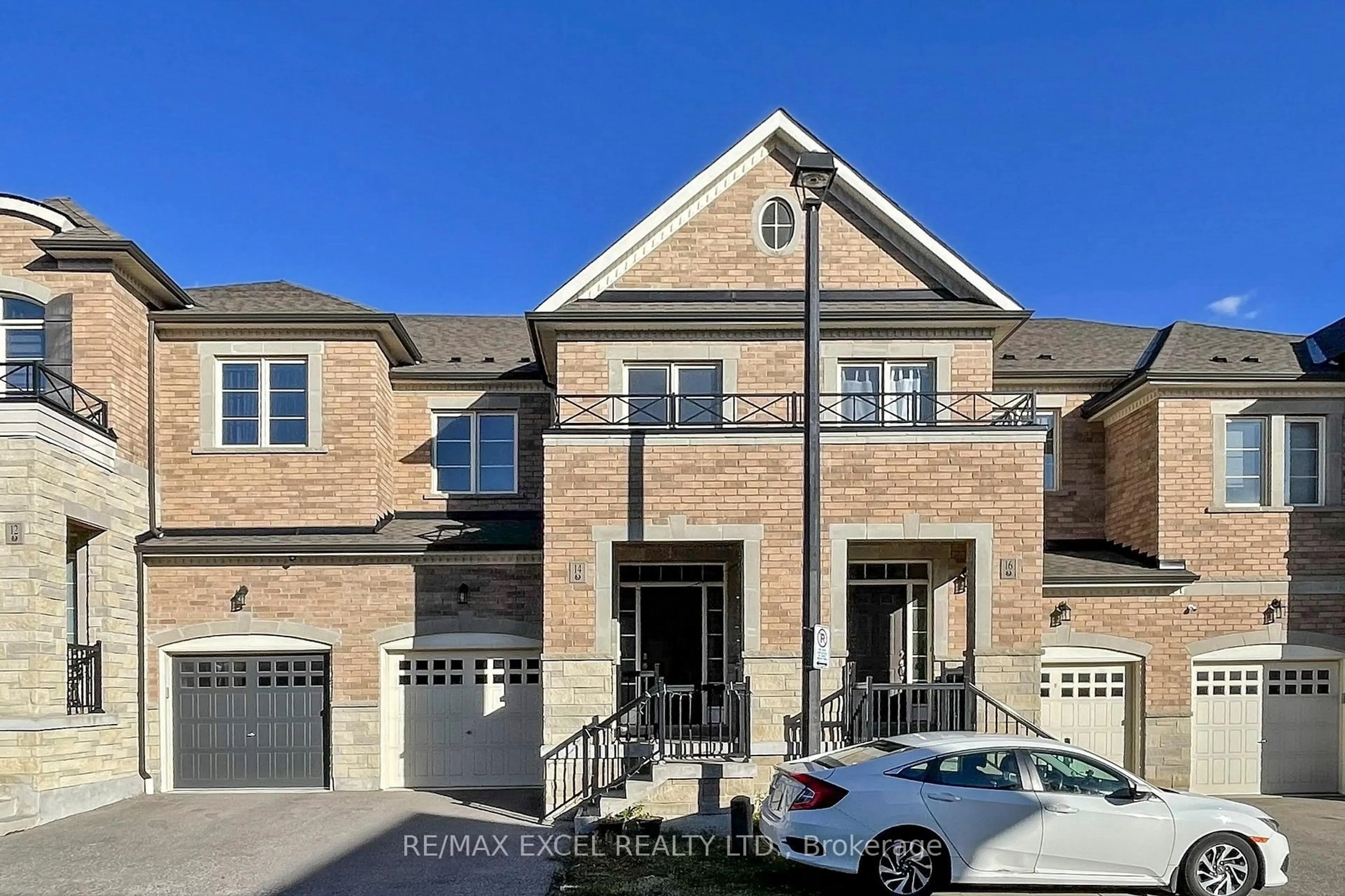 Home with brick exterior material, street for 14 TWINFLOWER Lane, Richmond Hill Ontario L4E 1E7