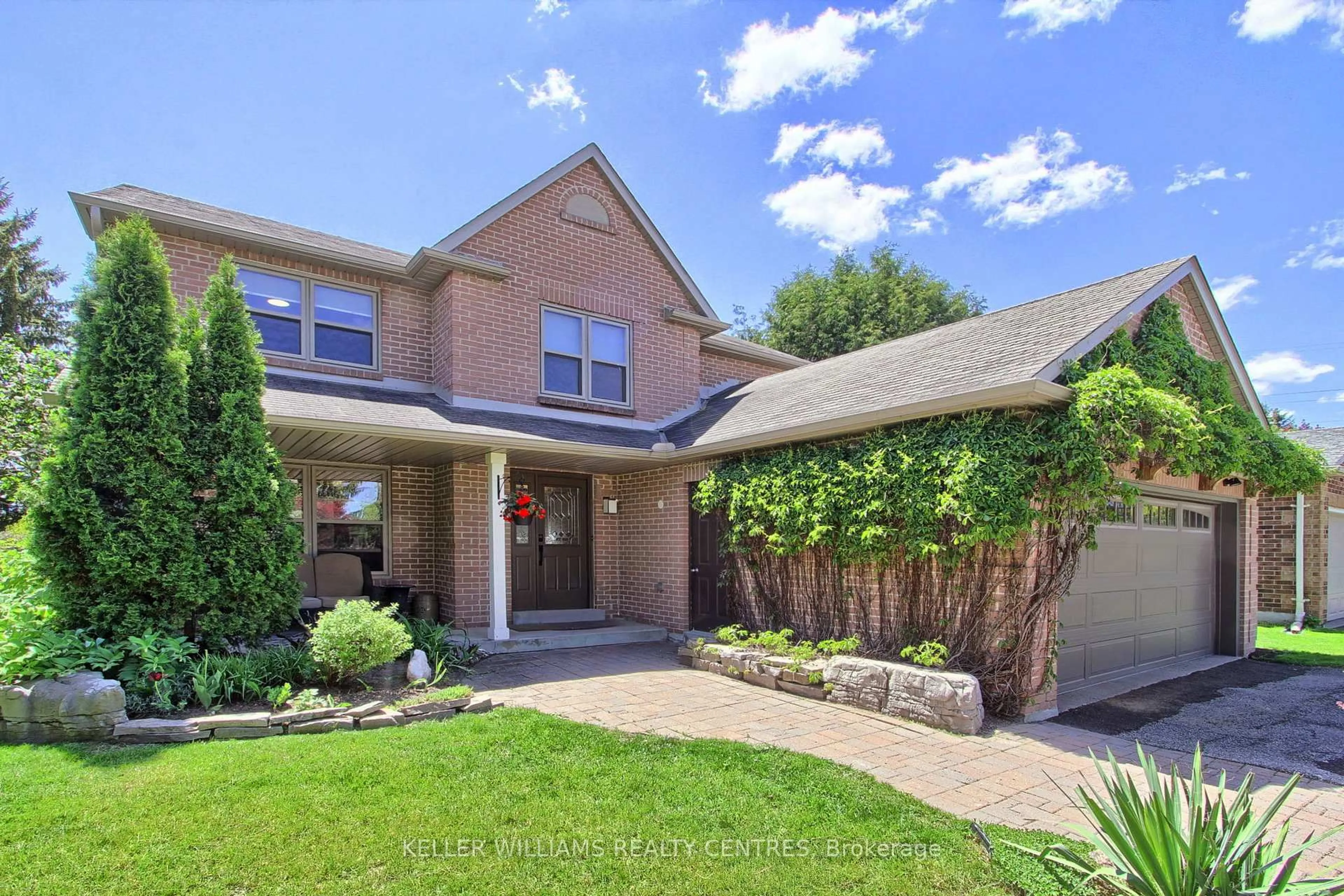 Home with brick exterior material, street for 204 Crossland Gate, Newmarket Ontario L3X 1A8
