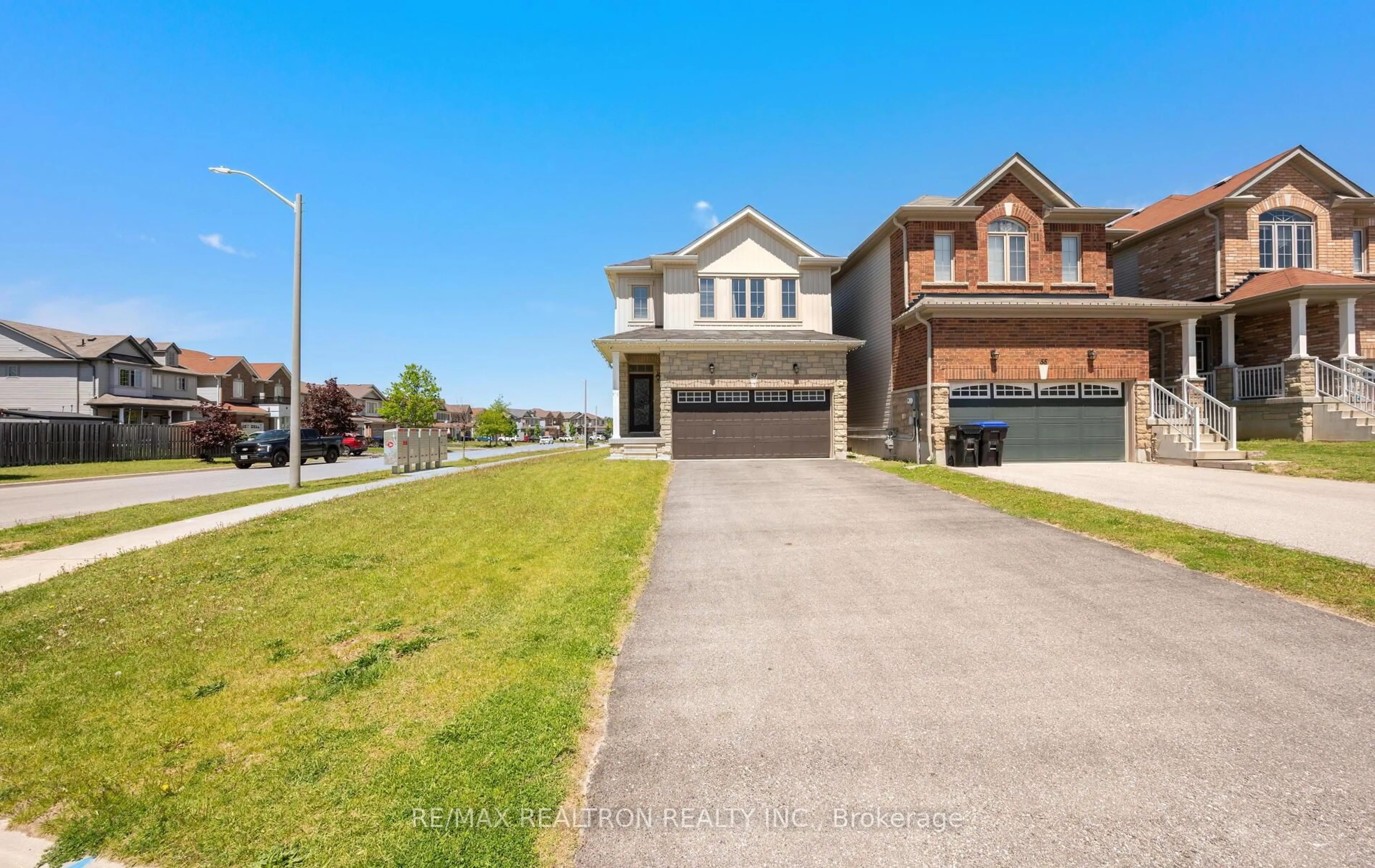 A pic from outside/outdoor area/front of a property/back of a property/a pic from drone, street for 57 Sasco Way, Essa Ontario L3W 0C8