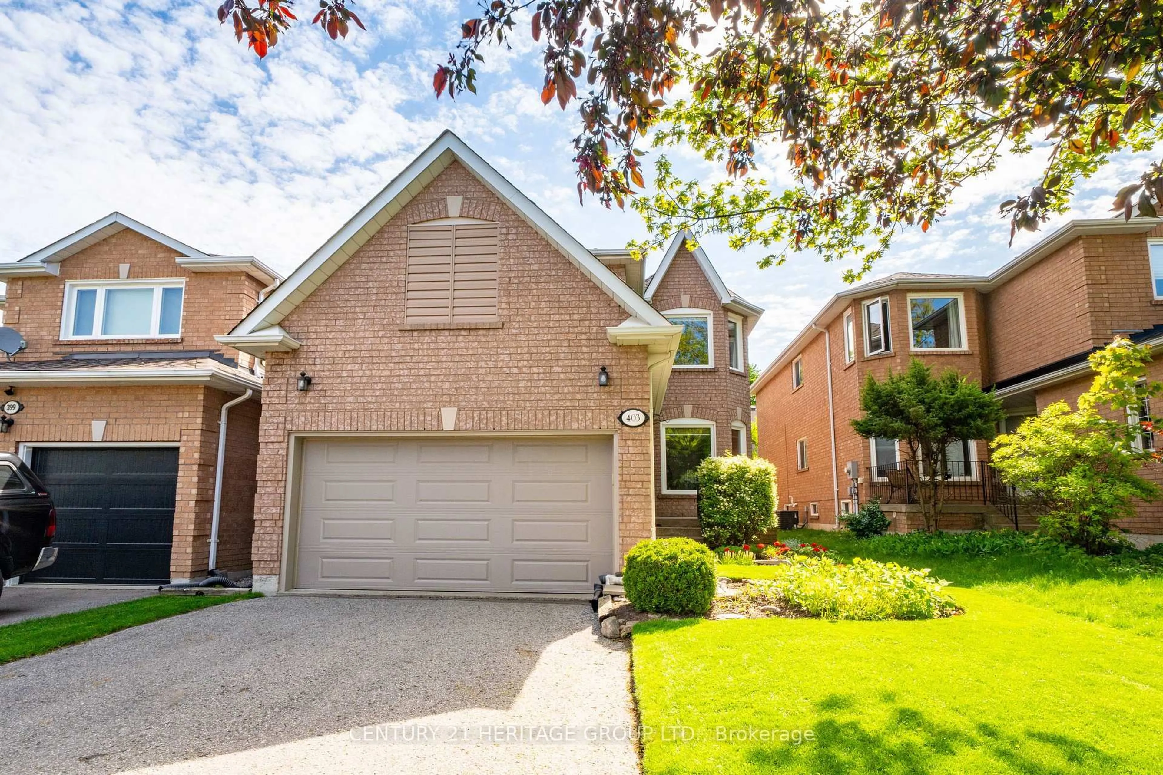 Home with brick exterior material, street for 403 Bartholomew Dr, Newmarket Ontario L3X 2E7