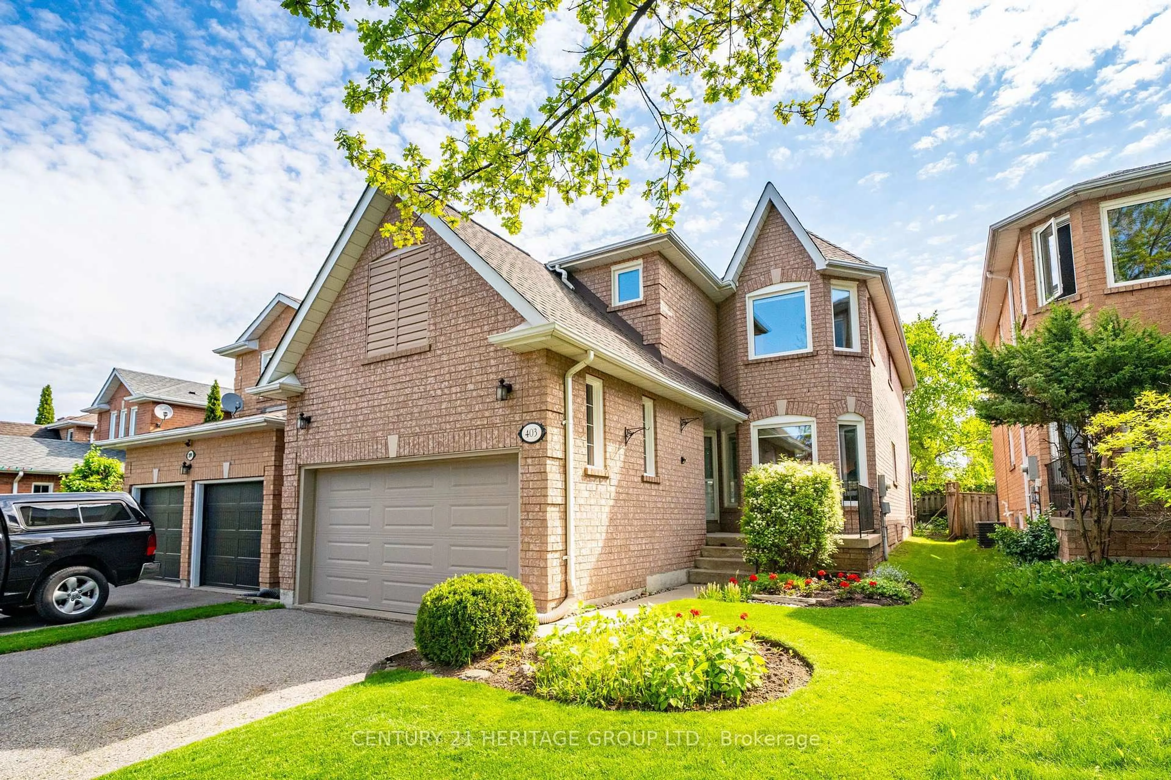 Home with brick exterior material, street for 403 Bartholomew Dr, Newmarket Ontario L3X 2E7