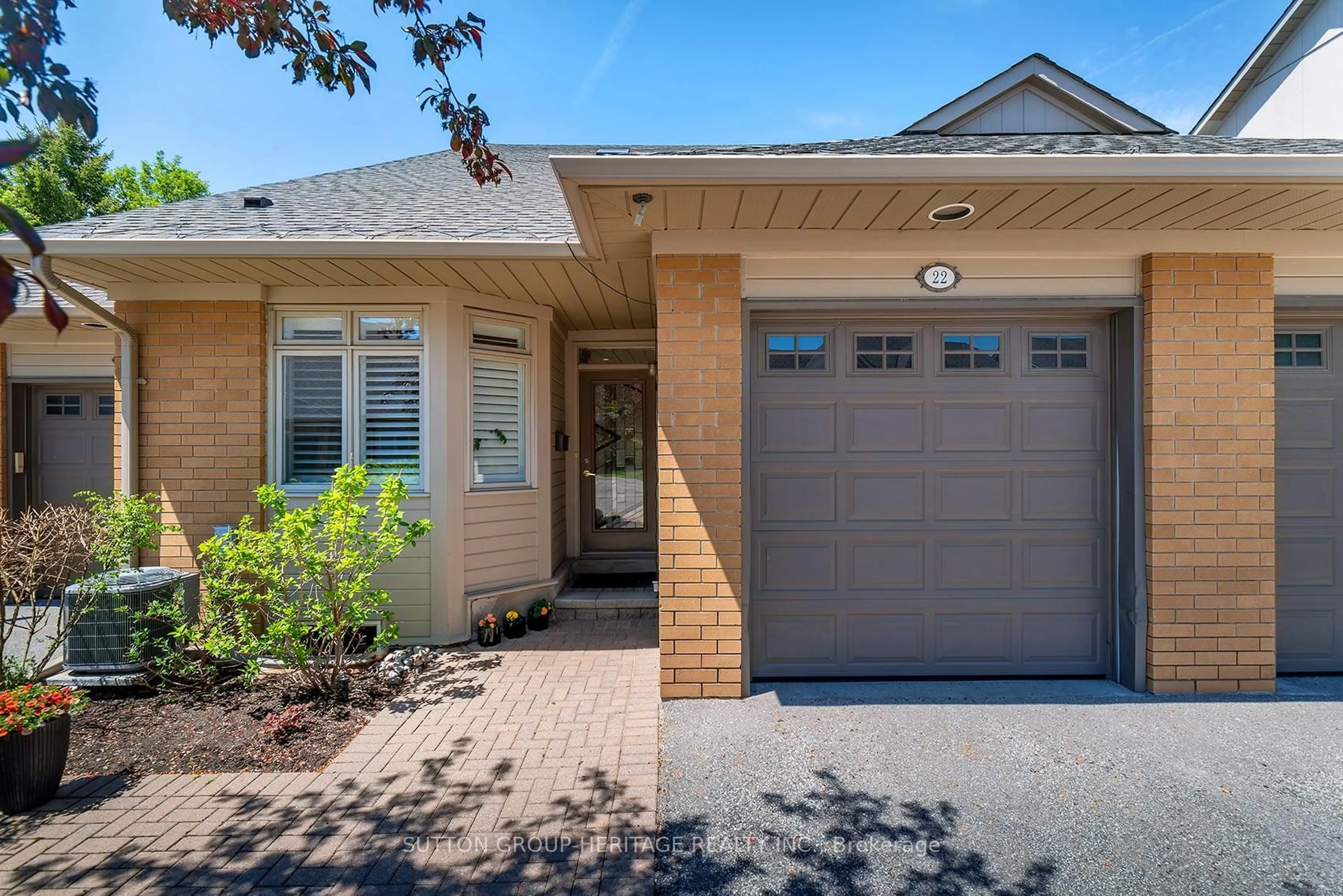 Home with brick exterior material, street for 22 Wave Hill Way, Markham Ontario L6E 1J2